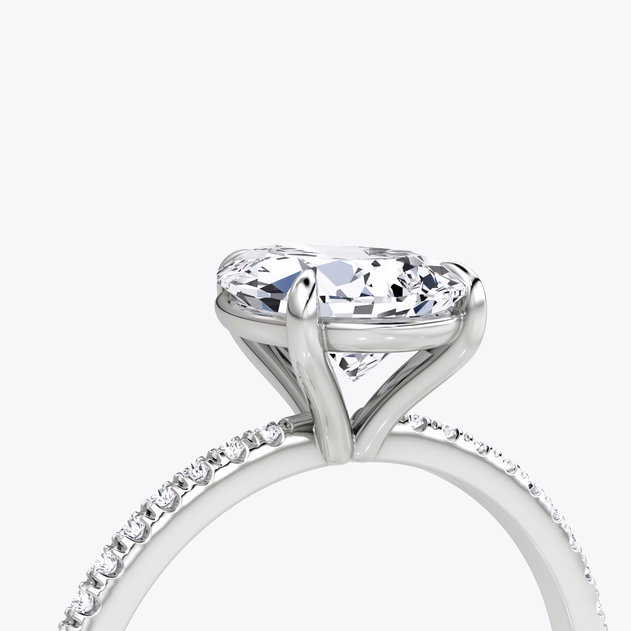 The Petite 4-Prong Solitaire | Pear | Platinum | bandAccent: Pavé | diamondOrientation: vertical | caratWeight: other