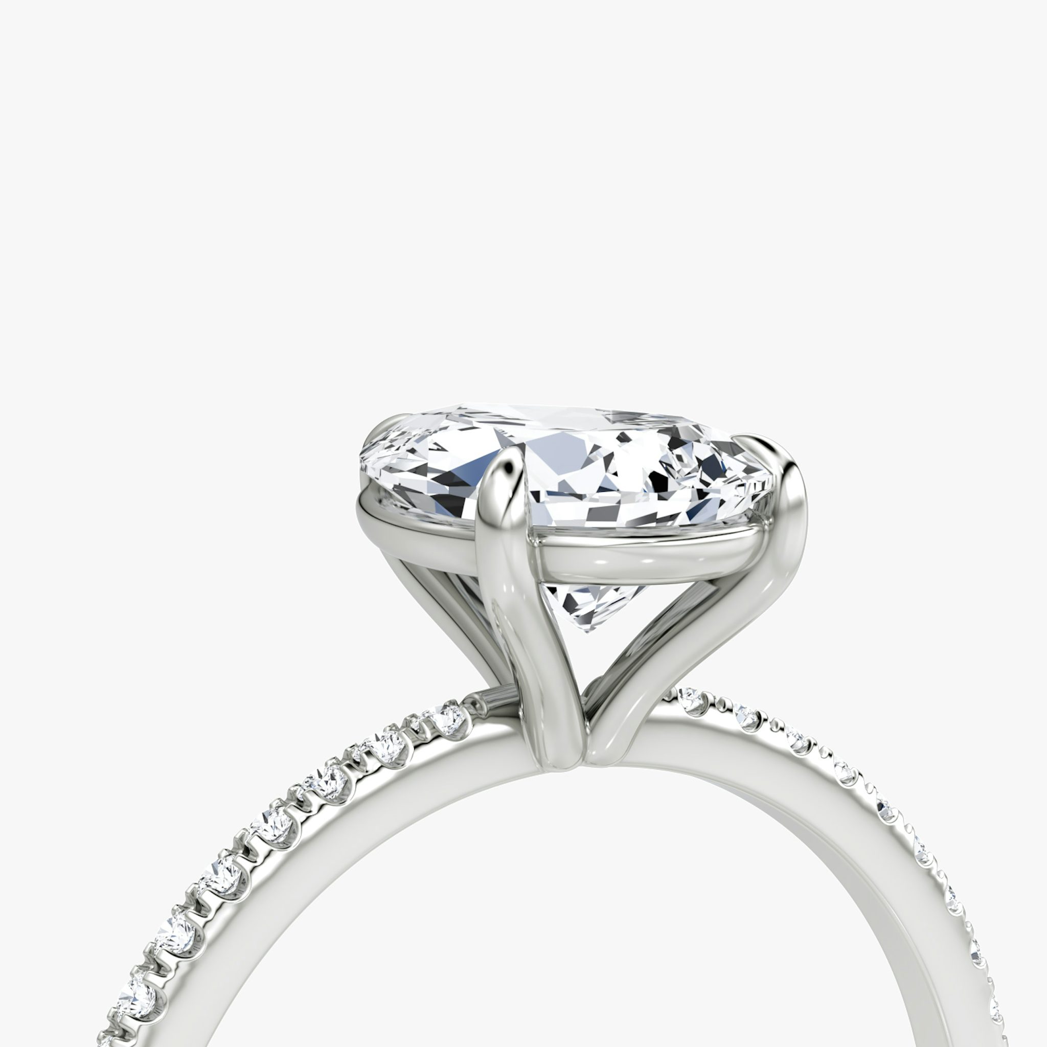 The Petite 4-Prong Solitaire | Pear | Platinum | bandAccent: Pavé | diamondOrientation: vertical | caratWeight: other