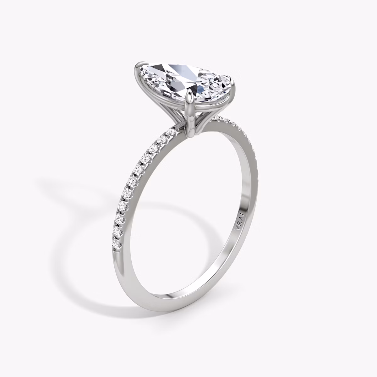 The Petite 4-Prong Solitaire | Pear | 18k | White Gold | bandAccent: Pavé | diamondOrientation: vertical | caratWeight: other