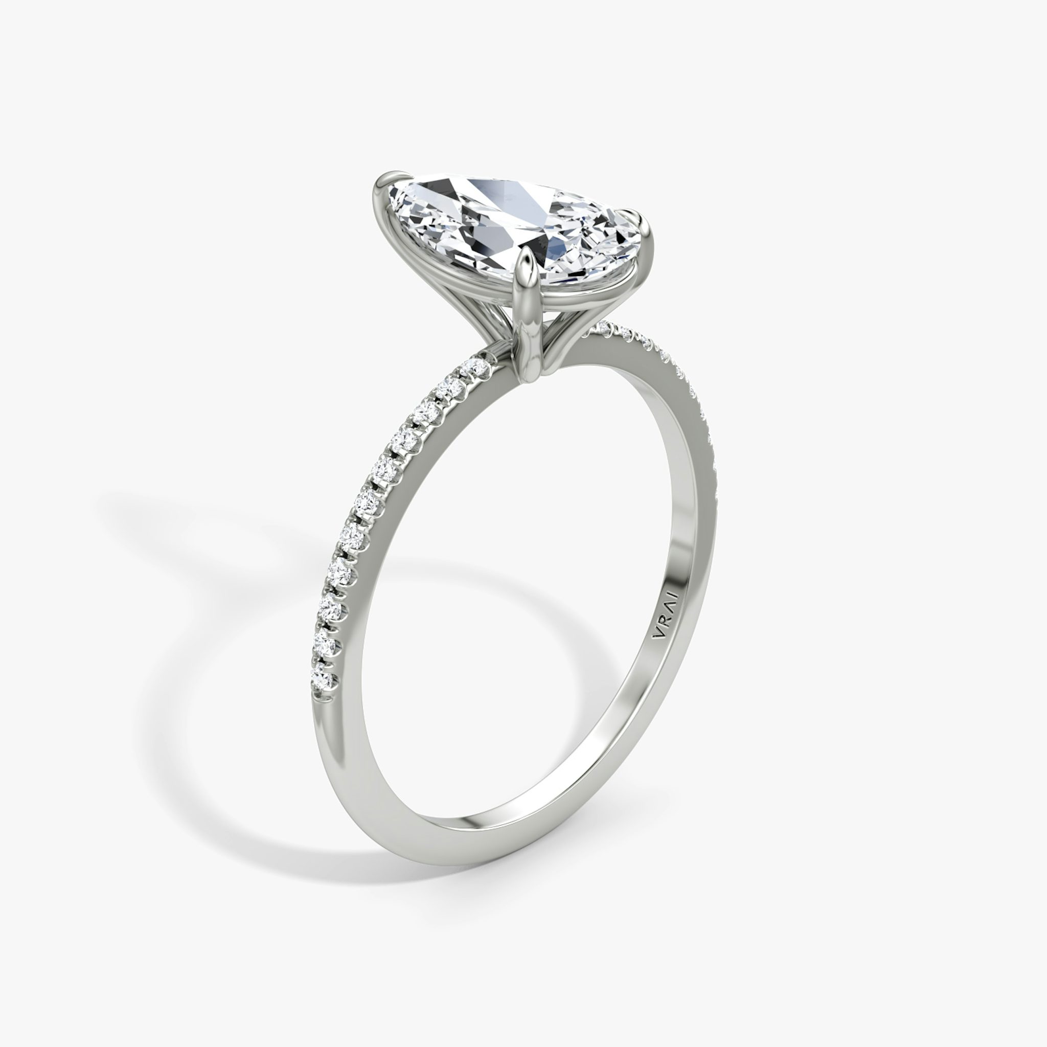 The Petite 4-Prong Solitaire | Pear | Platinum | bandAccent: Pavé | diamondOrientation: vertical | caratWeight: other