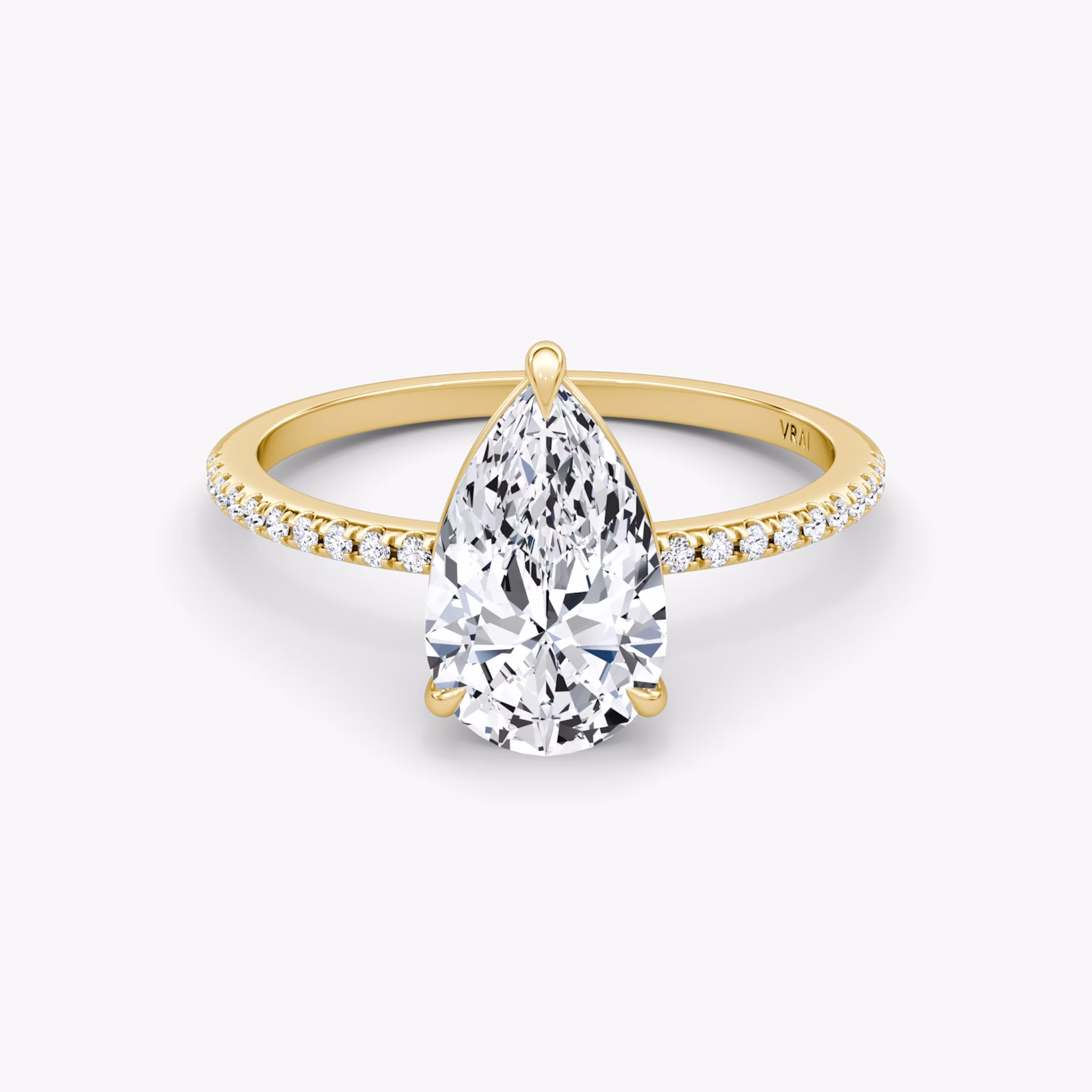 The Petite 4-Prong Solitaire | Pear | 18k | Yellow Gold | bandAccent: Pavé | diamondOrientation: vertical | caratWeight: other
