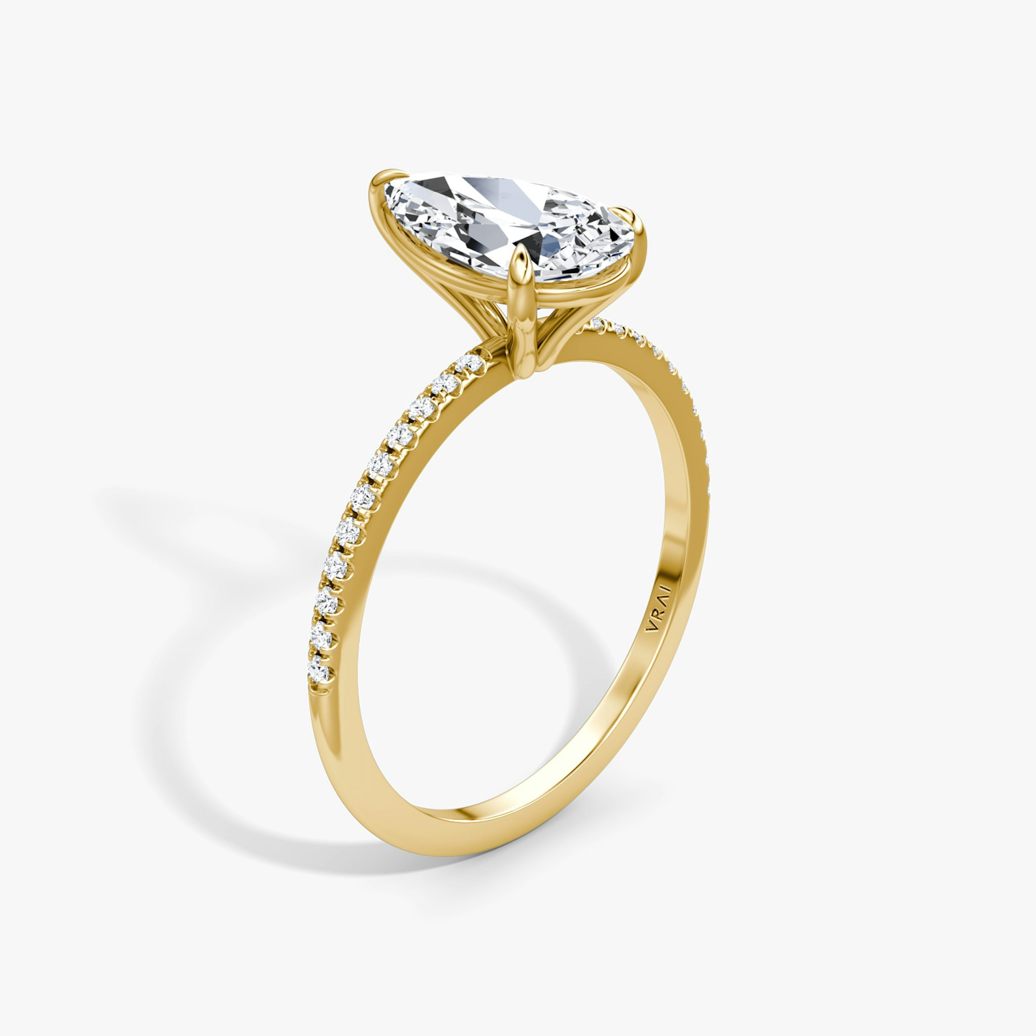 The Petite 4-Prong Solitaire | Pear | 18k | Yellow Gold | bandAccent: Pavé | diamondOrientation: vertical | caratWeight: other