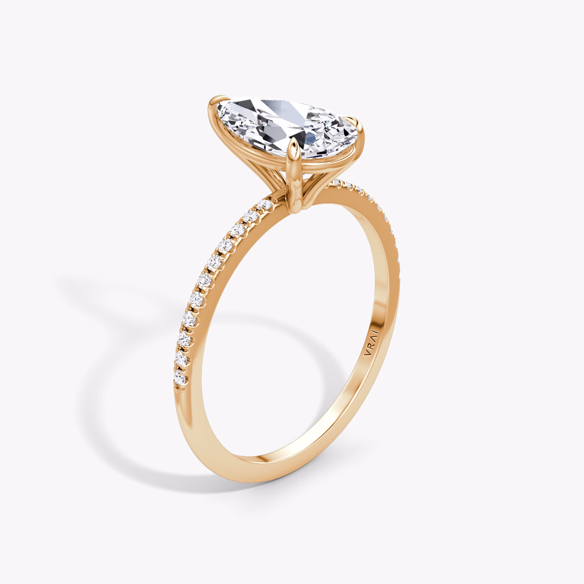 The Petite 4-Prong Solitaire | Pear | 14k | Rose Gold | bandAccent: Pavé | diamondOrientation: vertical | caratWeight: other