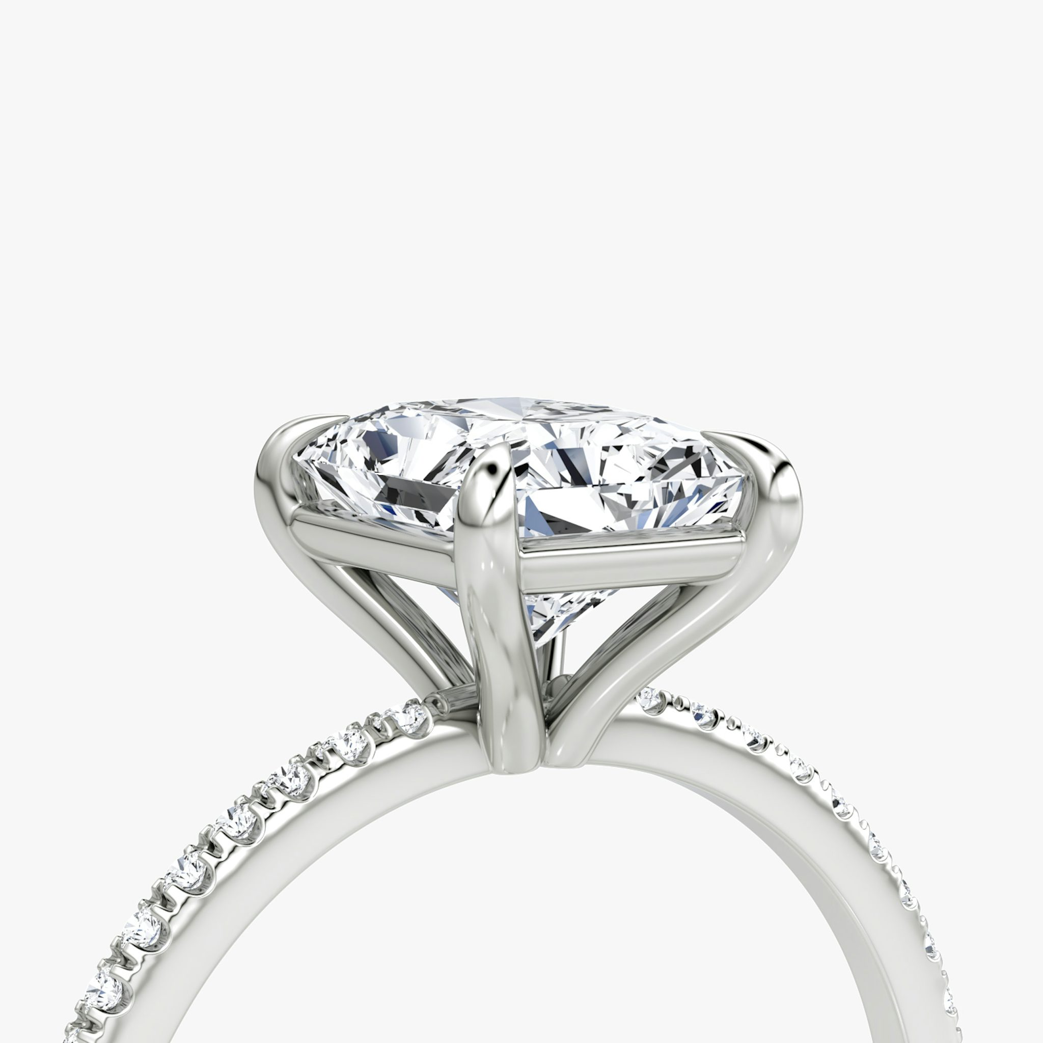 The Petite 4-Prong Solitaire | Radiant | Platinum | bandAccent: Pavé | diamondOrientation: vertical | caratWeight: other
