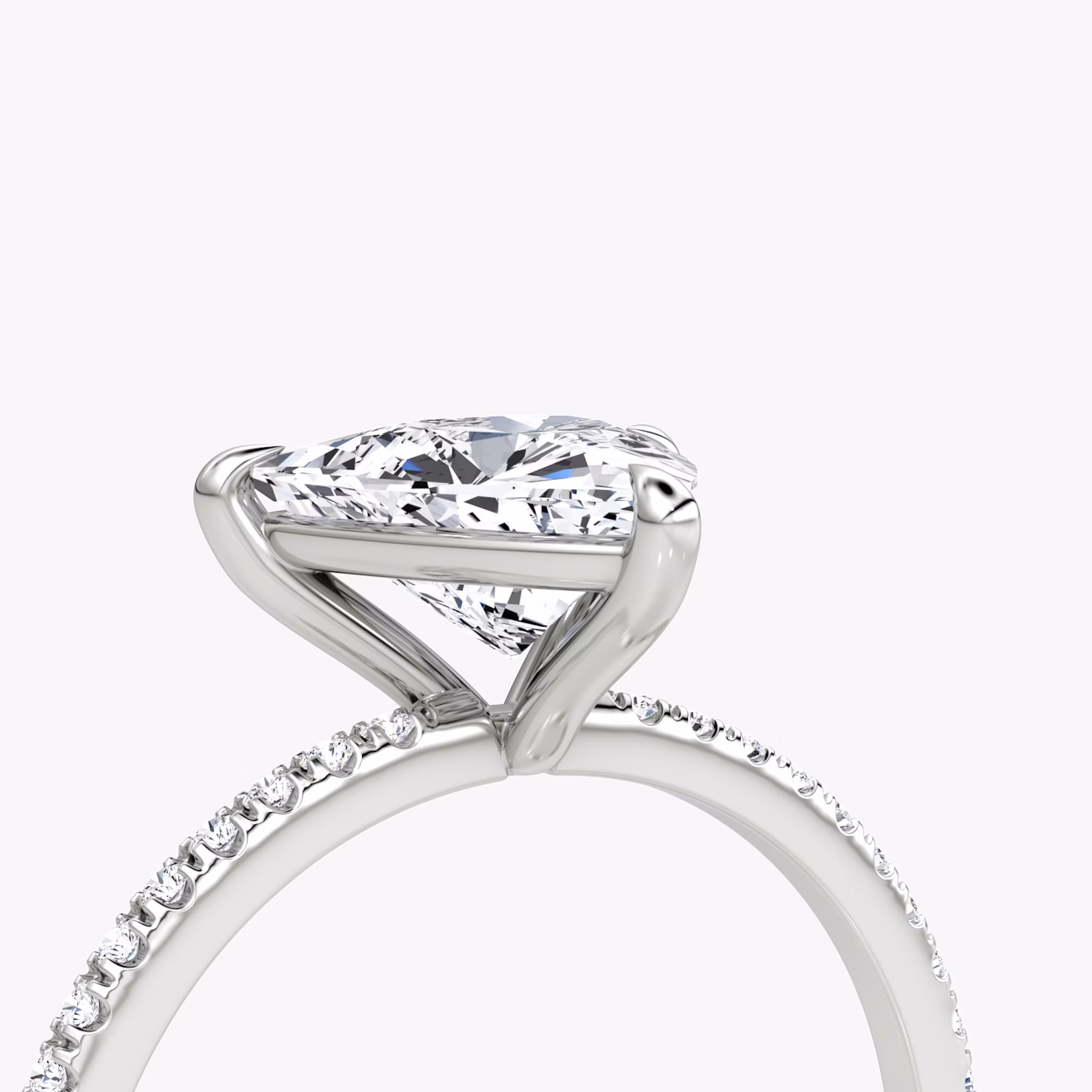 The Petite 4-Prong Solitaire | Trillion | Platinum | bandAccent: Pavé | diamondOrientation: vertical | caratWeight: other