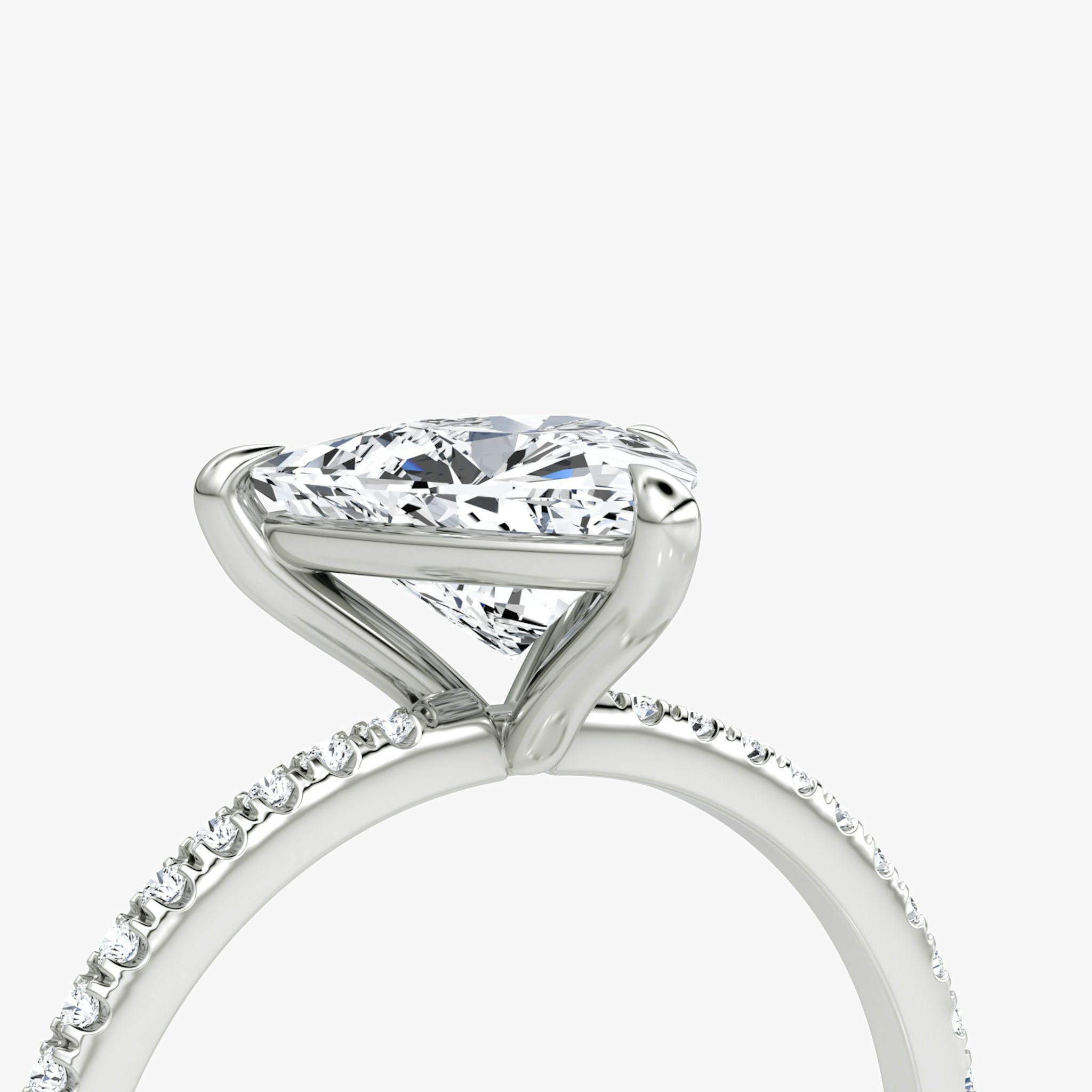 The Petite 4-Prong Solitaire | Trillion | Platinum | bandAccent: Pavé | diamondOrientation: vertical | caratWeight: other