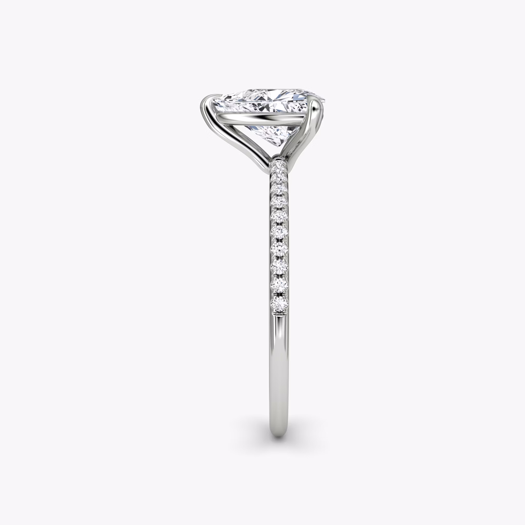 The Petite 4-Prong Solitaire | Trillion | Platinum | bandAccent: Pavé | diamondOrientation: vertical | caratWeight: other