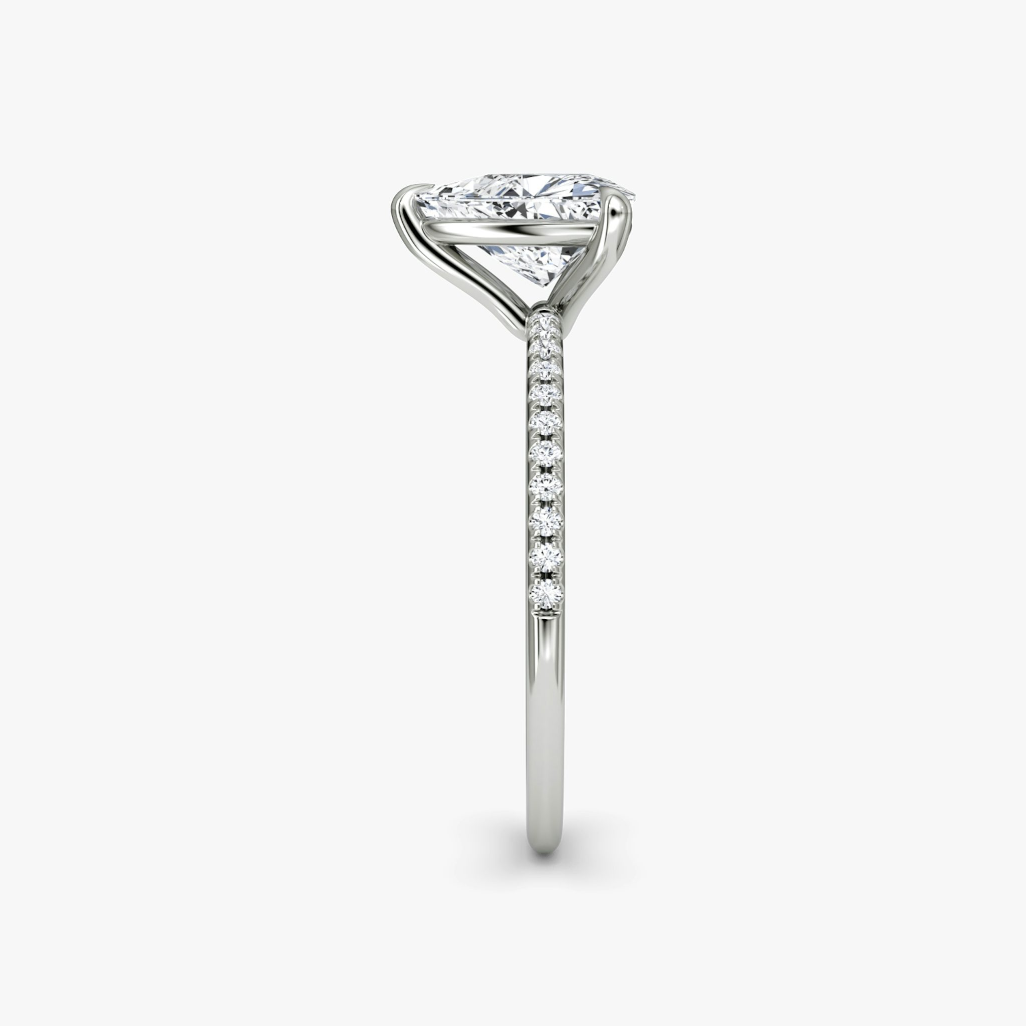 The Petite 4-Prong Solitaire | Trillion | Platinum | bandAccent: Pavé | diamondOrientation: vertical | caratWeight: other