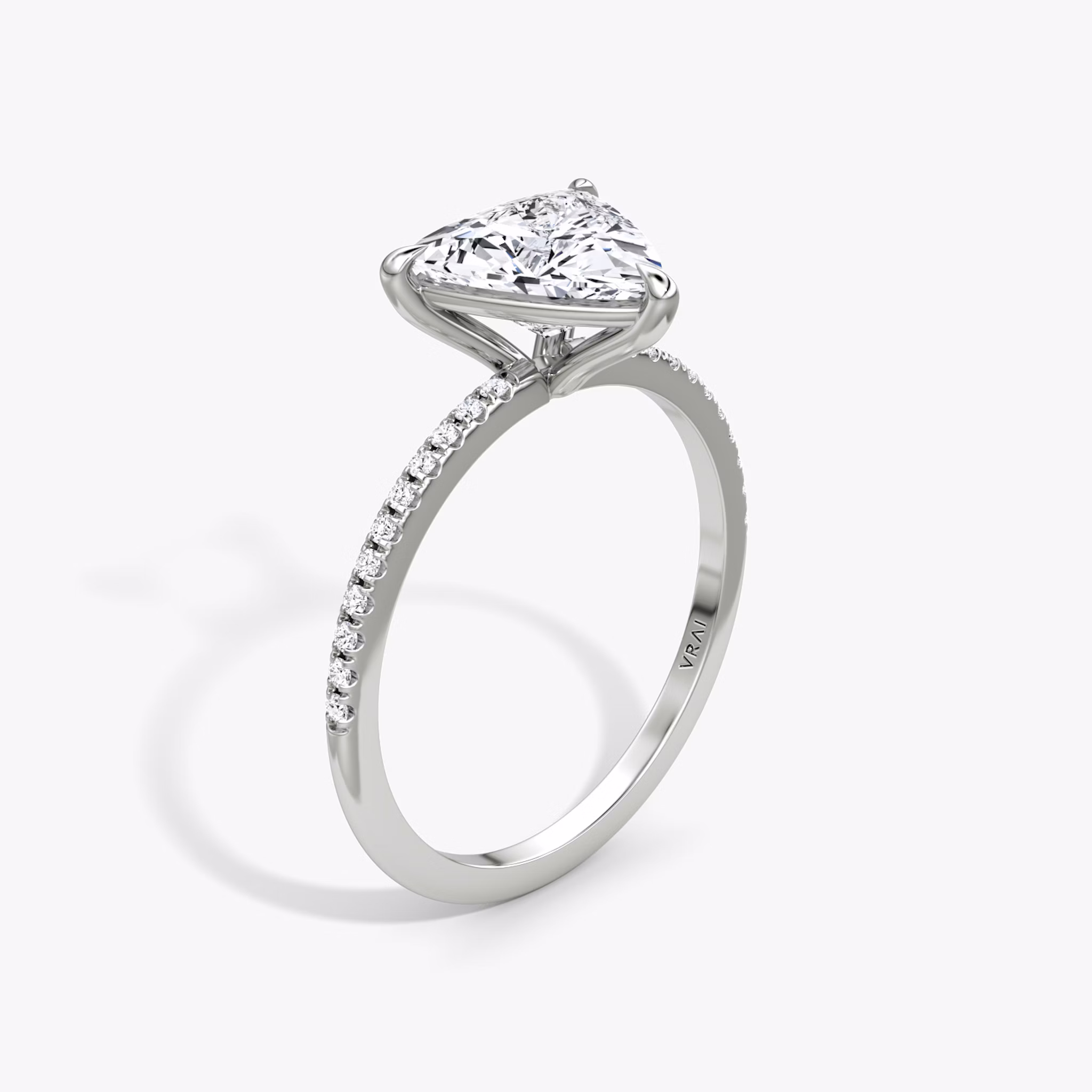The Petite 4-Prong Solitaire | Trillion | Platinum | bandAccent: Pavé | diamondOrientation: vertical | caratWeight: other