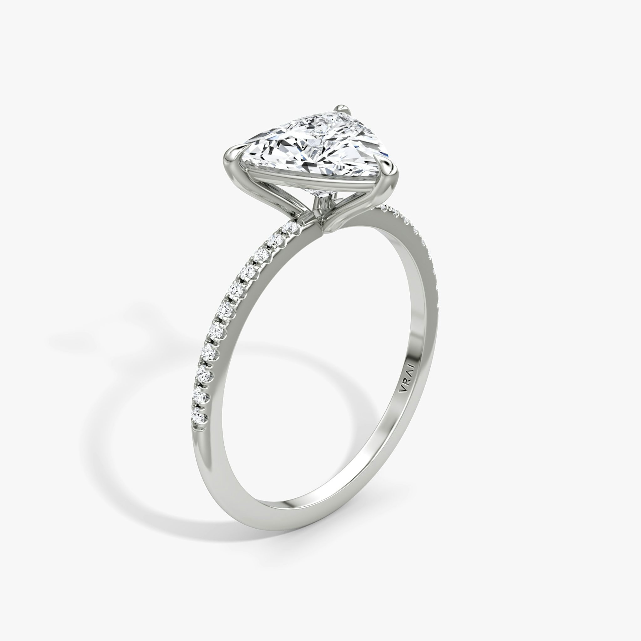 The Petite 4-Prong Solitaire | Trillion | Platinum | bandAccent: Pavé | diamondOrientation: vertical | caratWeight: other