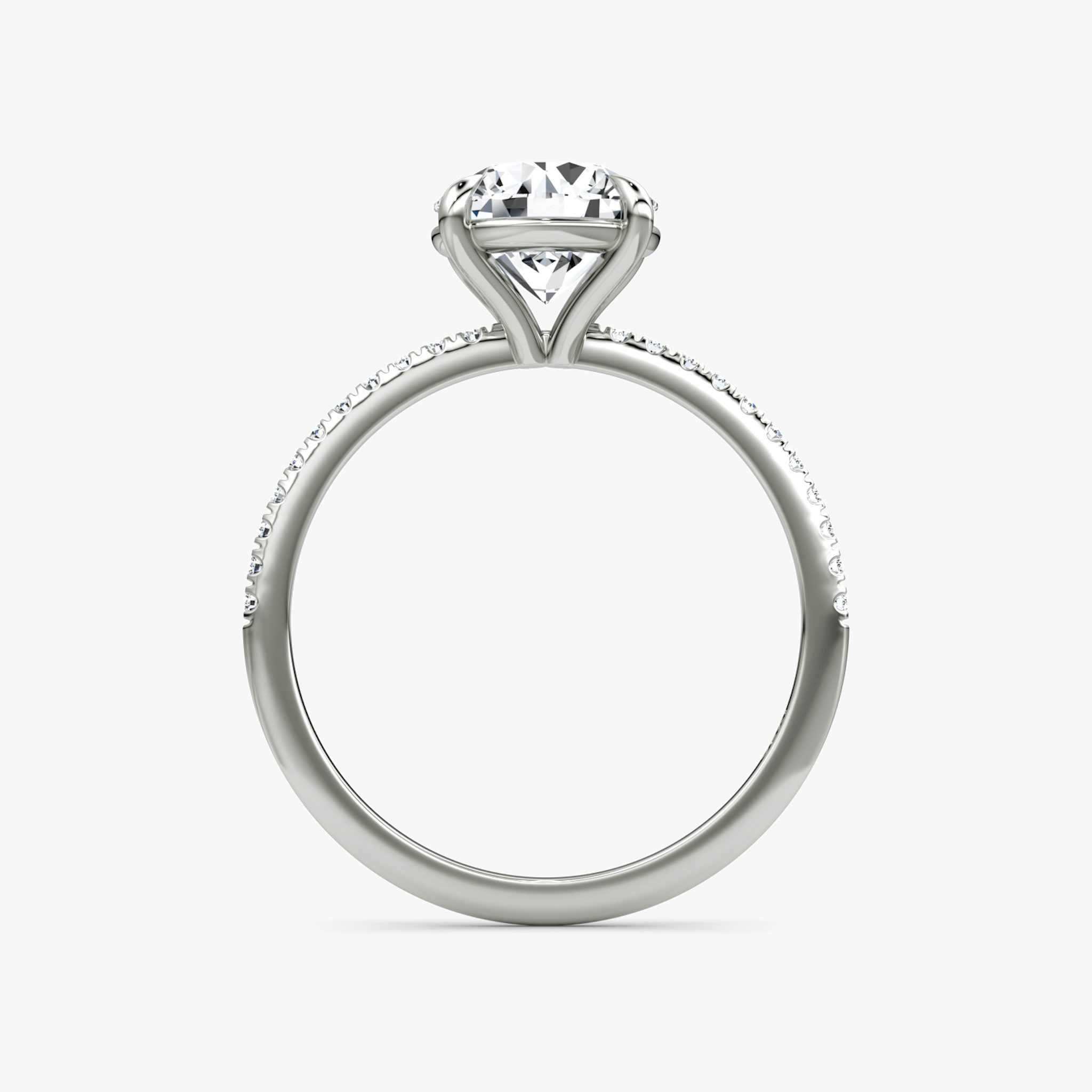 The Petite 4-Prong Solitaire | Round Brilliant | Platinum | bandAccent: Pavé | caratWeight: other | diamondOrientation: vertical