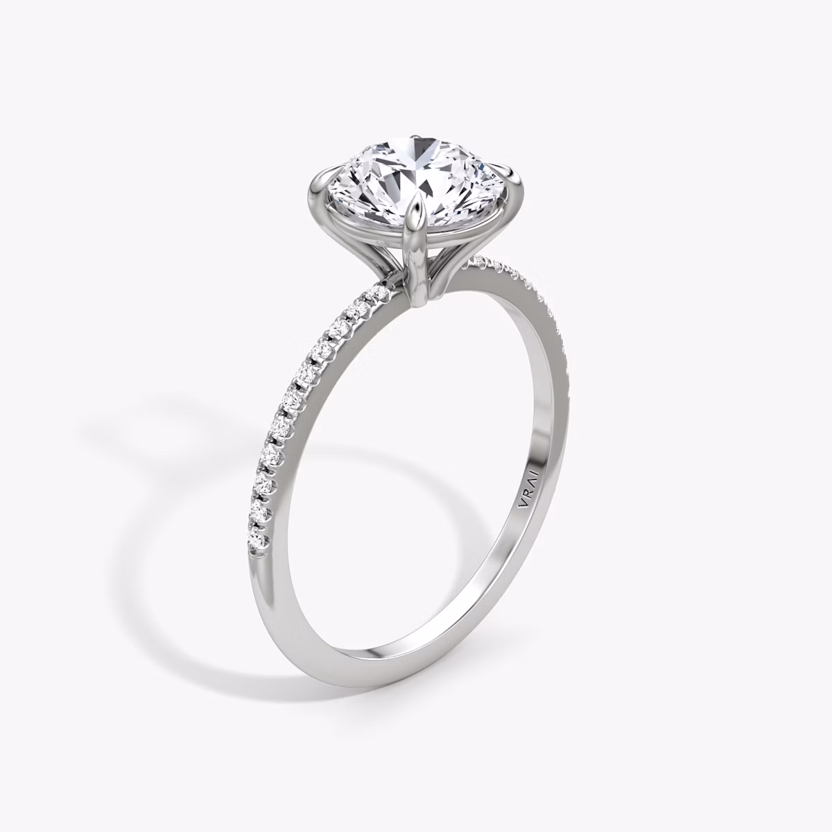 The Petite 4-Prong Solitaire | Round Brilliant | 18k | White Gold | bandAccent: Pavé | caratWeight: 1.0ct | diamondOrientation: vertical