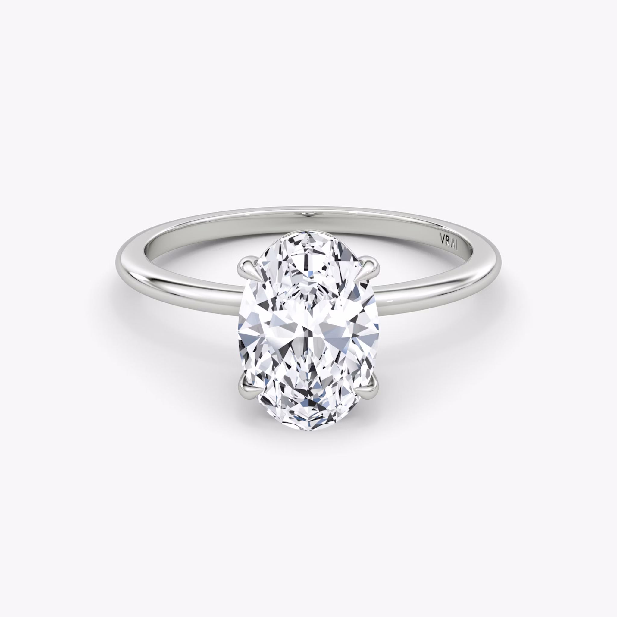 The Petite 4-Prong Solitaire | Oval | Platinum | bandAccent: Plain | diamondOrientation: vertical | caratWeight: other