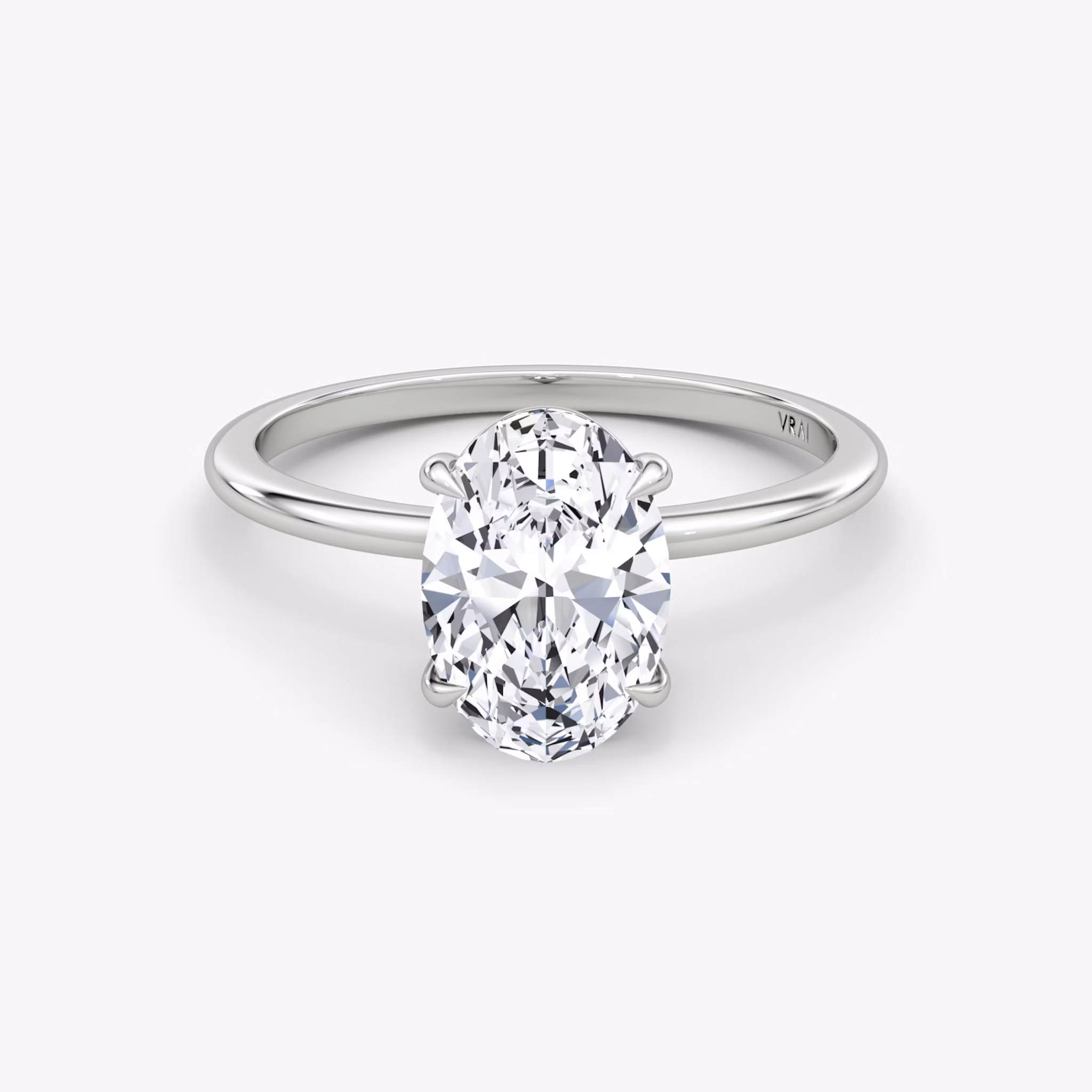 The Petite 4-Prong Solitaire | Oval | Platinum | bandAccent: Plain | diamondOrientation: vertical | caratWeight: other