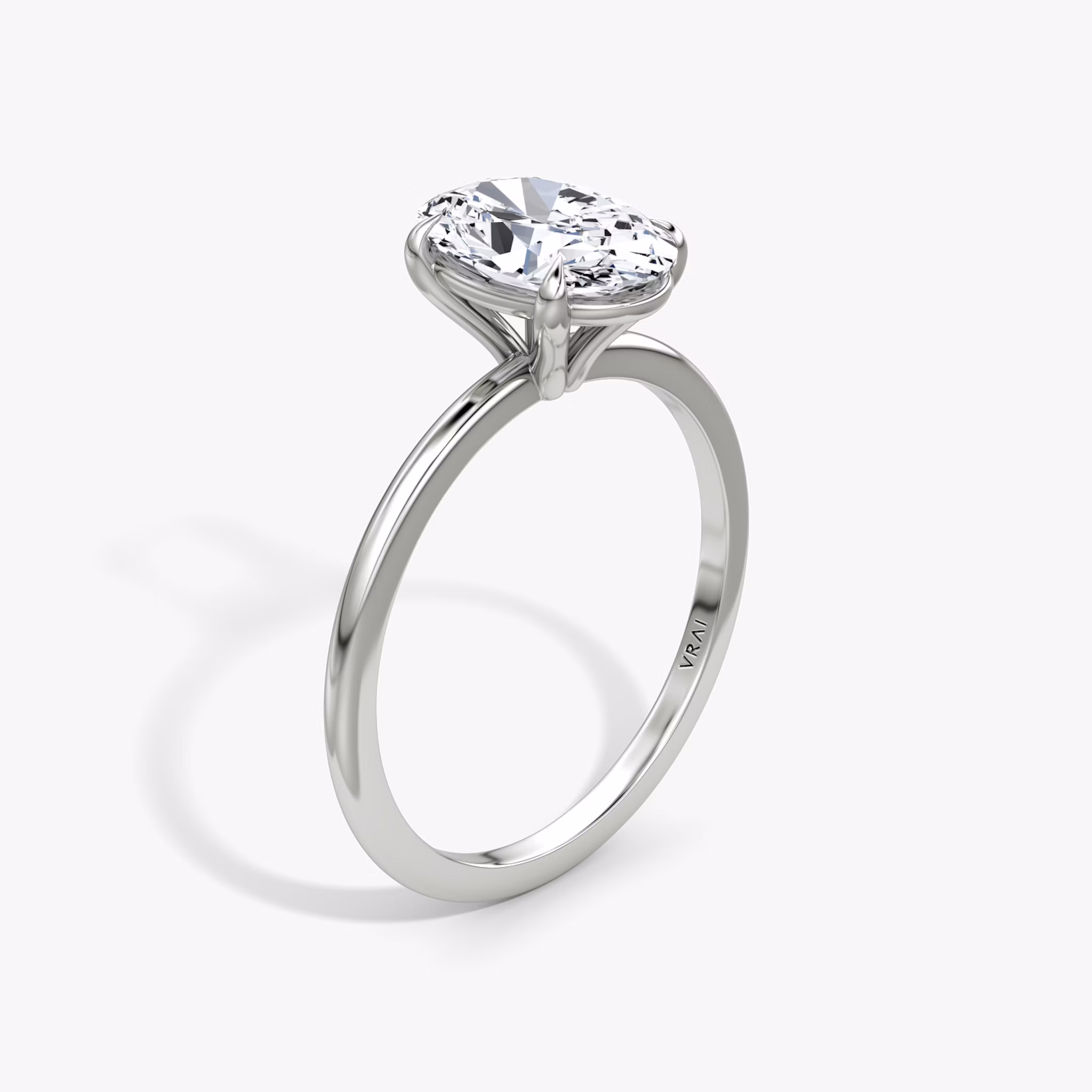 The Petite 4-Prong Solitaire | Oval | Platinum | bandAccent: Plain | diamondOrientation: vertical | caratWeight: other