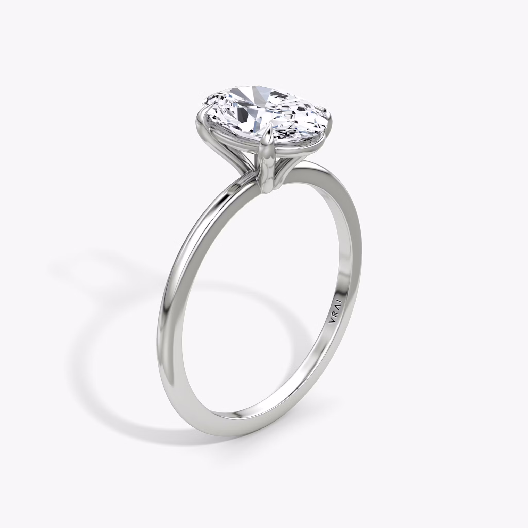 The Petite 4-Prong Solitaire | Oval | Platinum | bandAccent: Plain | diamondOrientation: vertical | caratWeight: other