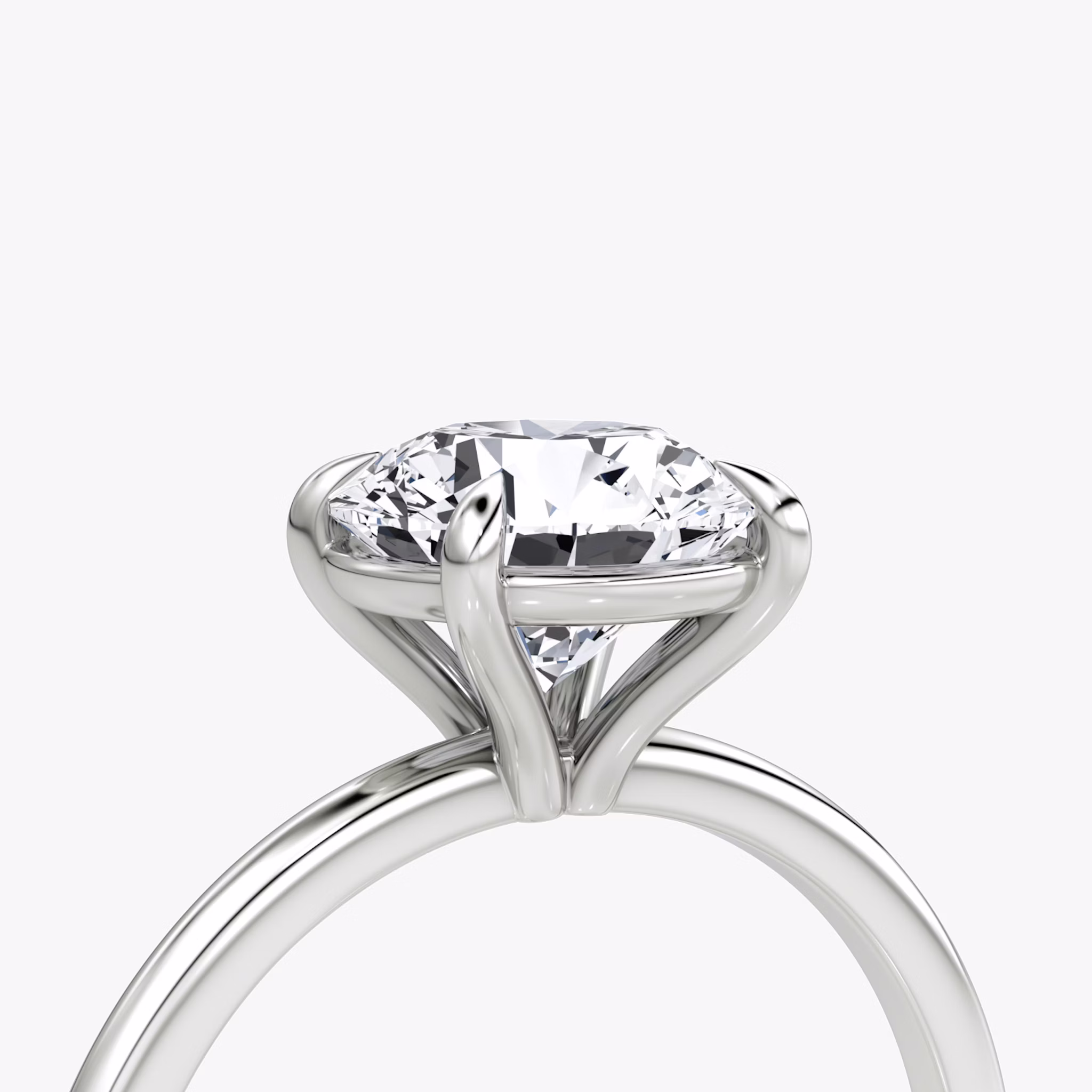 The Petite 4-Prong Solitaire | Round Brilliant | Platinum | bandAccent: Plain | caratWeight: other | diamondOrientation: vertical
