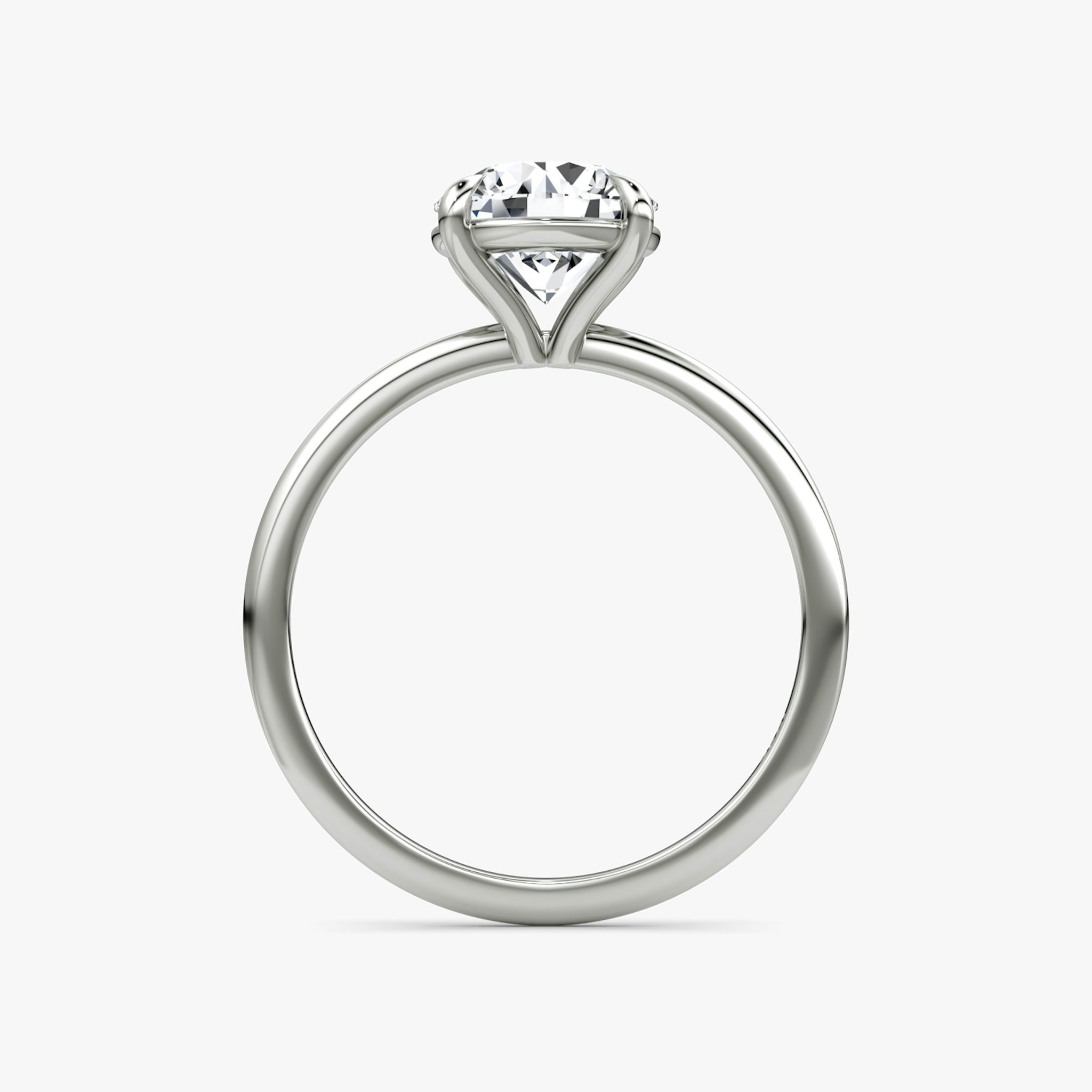 The Petite 4-Prong Solitaire | Round Brilliant | Platinum | bandAccent: Plain | caratWeight: other | diamondOrientation: vertical