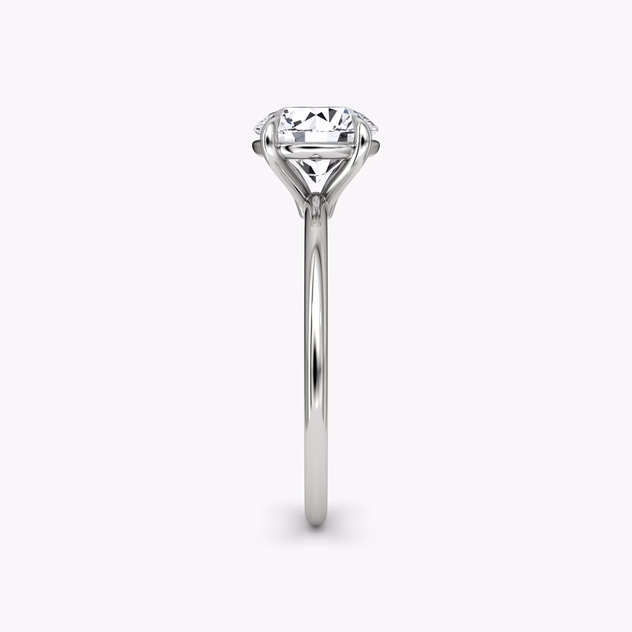 The Petite 4-Prong Solitaire | Round Brilliant | Platinum | bandAccent: Plain | caratWeight: other | diamondOrientation: vertical