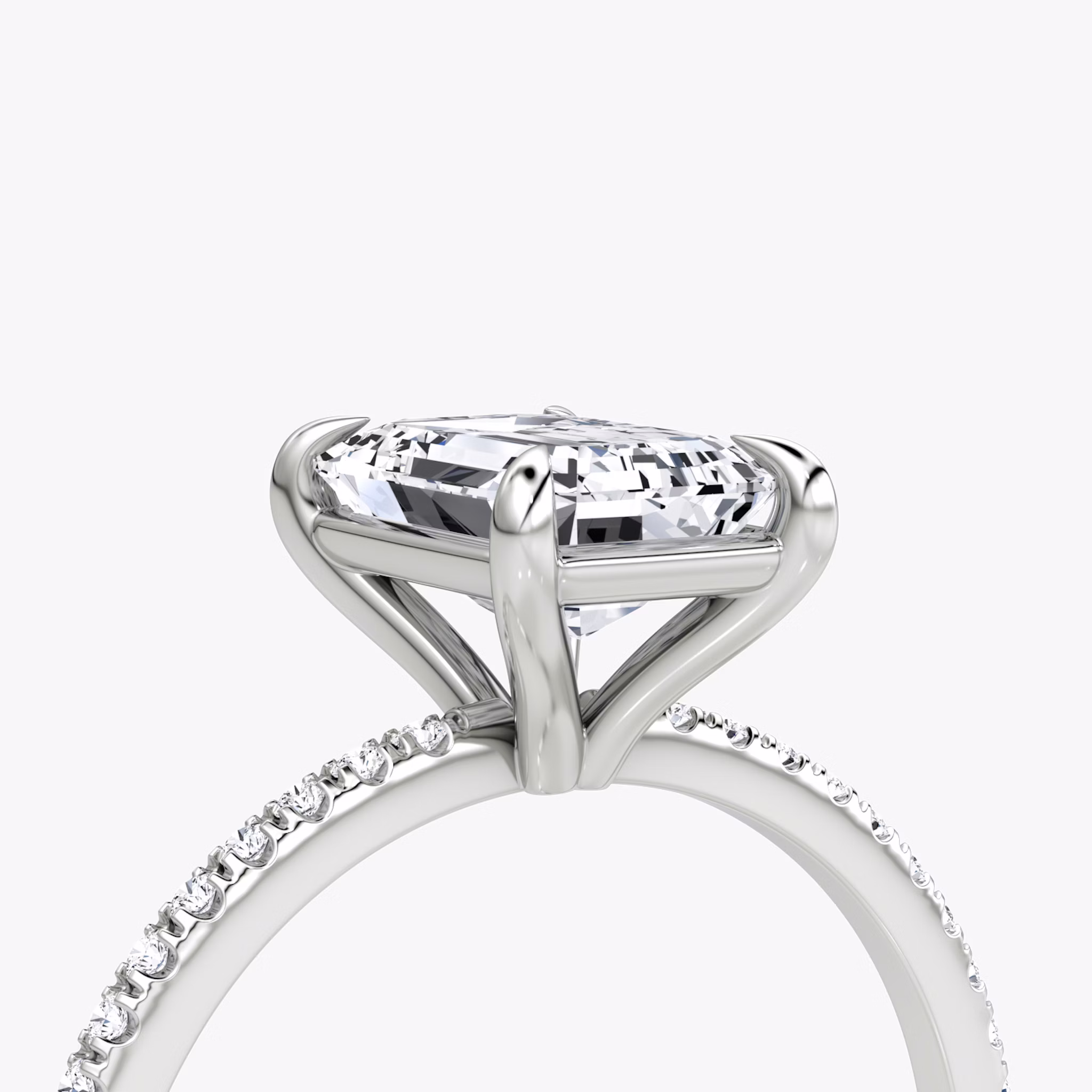 The Petite 4-Prong Solitaire | Emerald | Platinum | bandAccent: Pavé | diamondOrientation: vertical | caratWeight: other