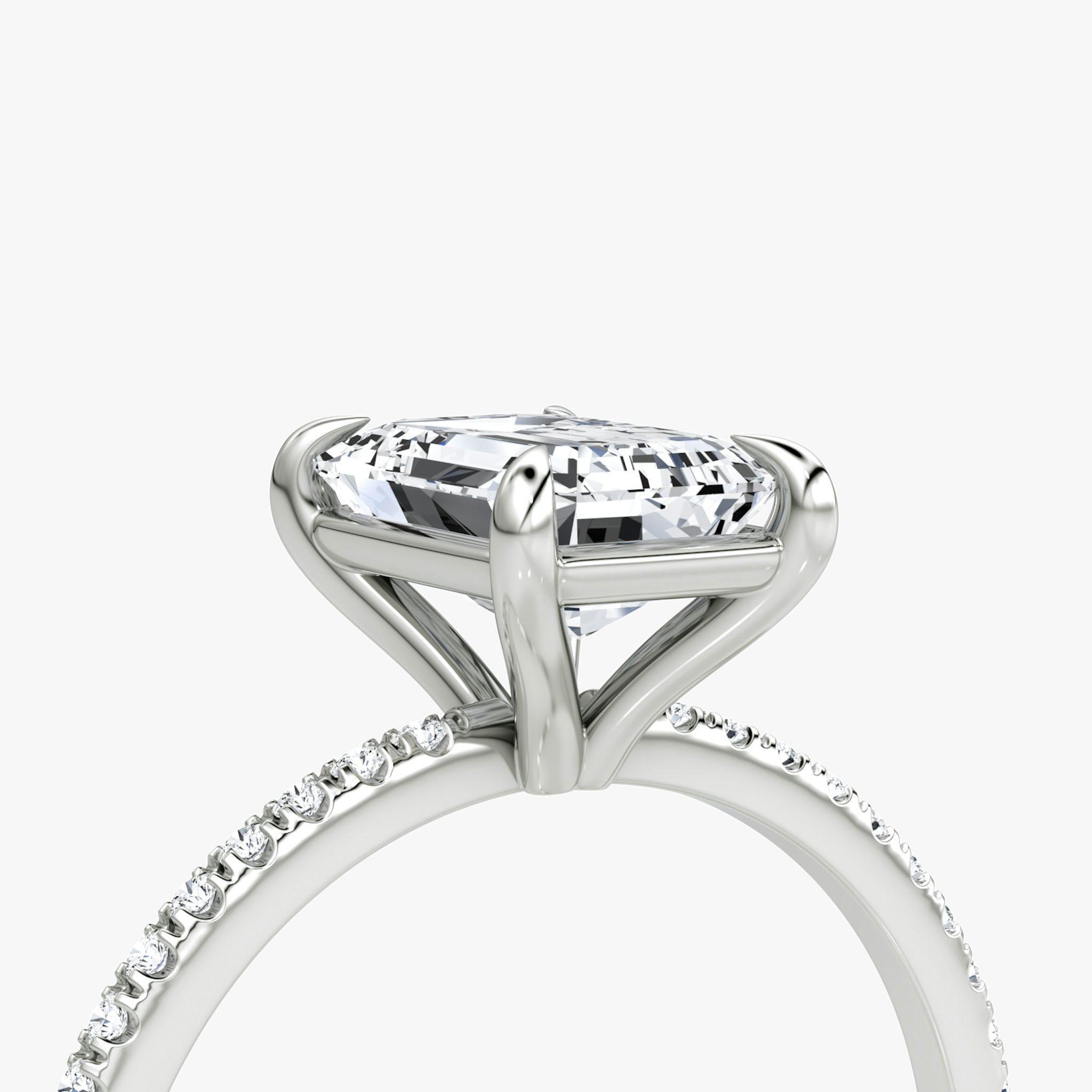 The Petite 4-Prong Solitaire | Emerald | Platinum | bandAccent: Pavé | diamondOrientation: vertical | caratWeight: other