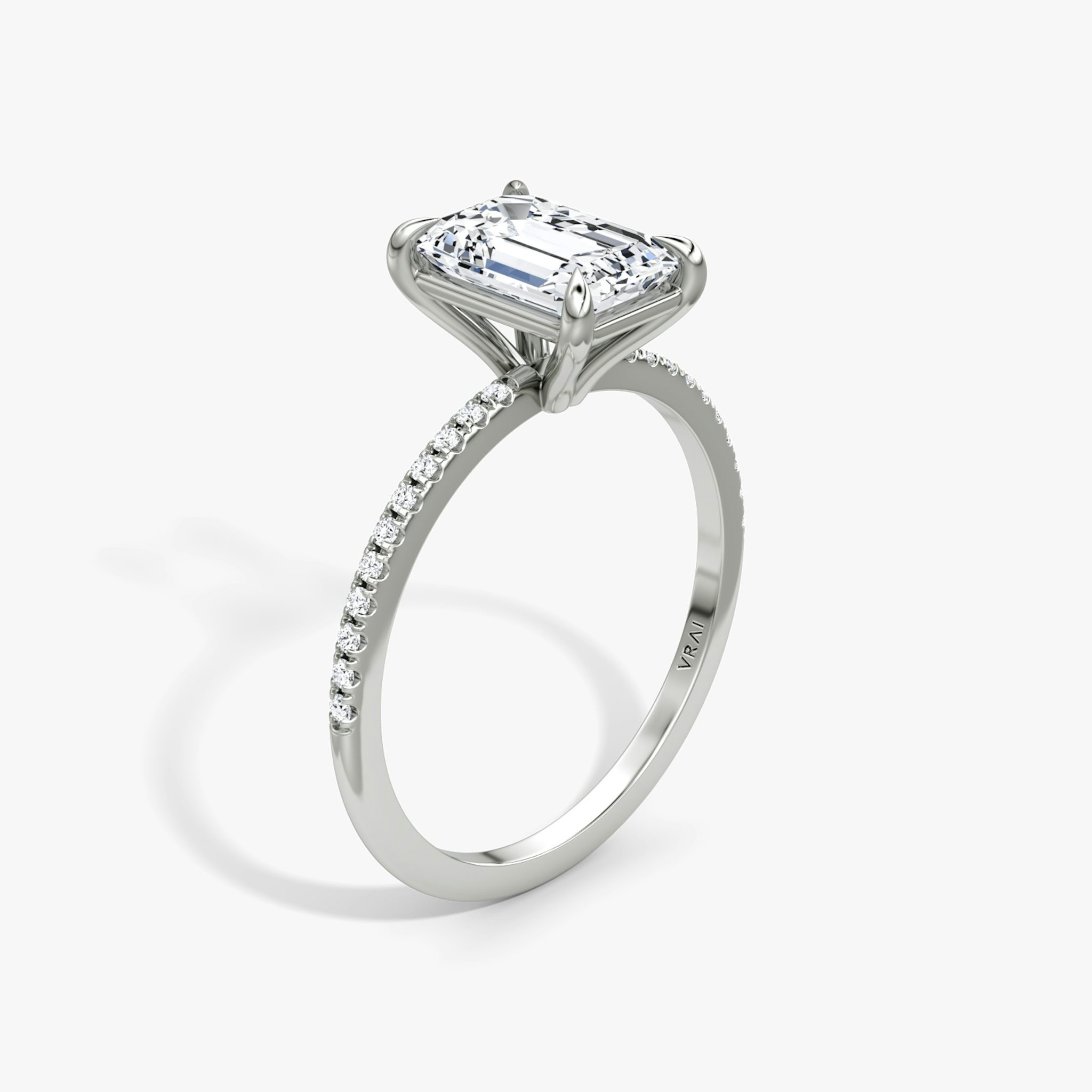 The Petite 4-Prong Solitaire | Emerald | Platinum | bandAccent: Pavé | diamondOrientation: vertical | caratWeight: other