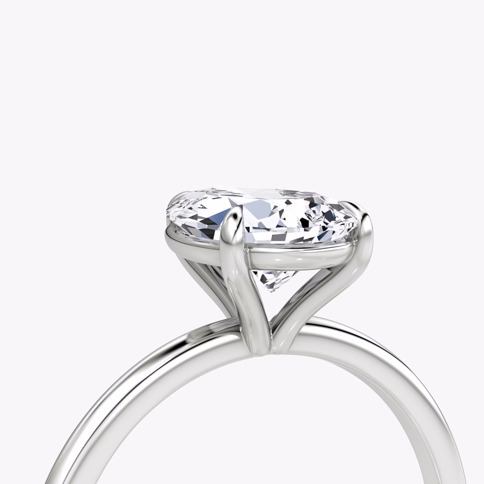 The Petite 4-Prong Solitaire | Pear | Platinum | bandAccent: Plain | diamondOrientation: vertical | caratWeight: other