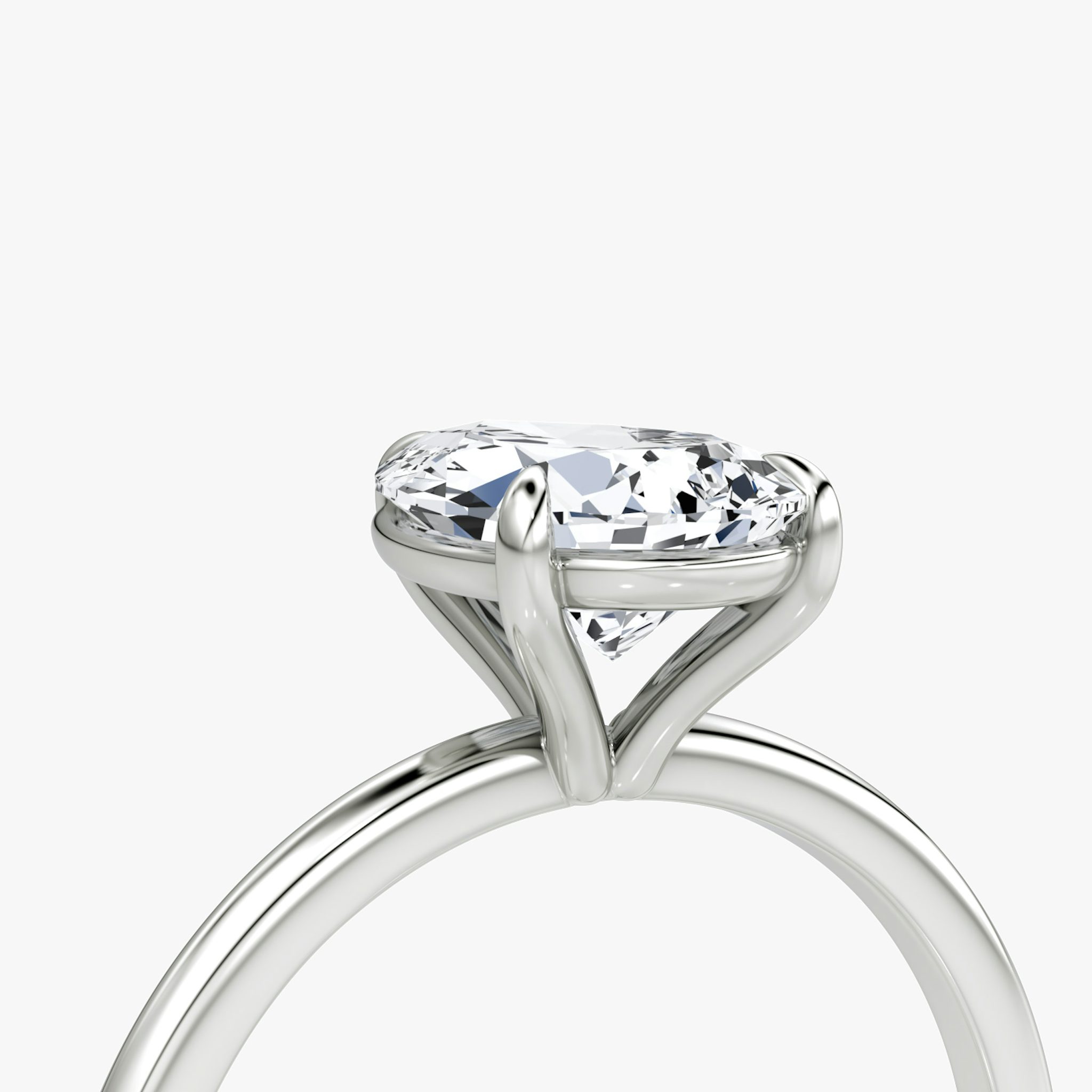 The Petite 4-Prong Solitaire | Pear | Platinum | bandAccent: Plain | diamondOrientation: vertical | caratWeight: other