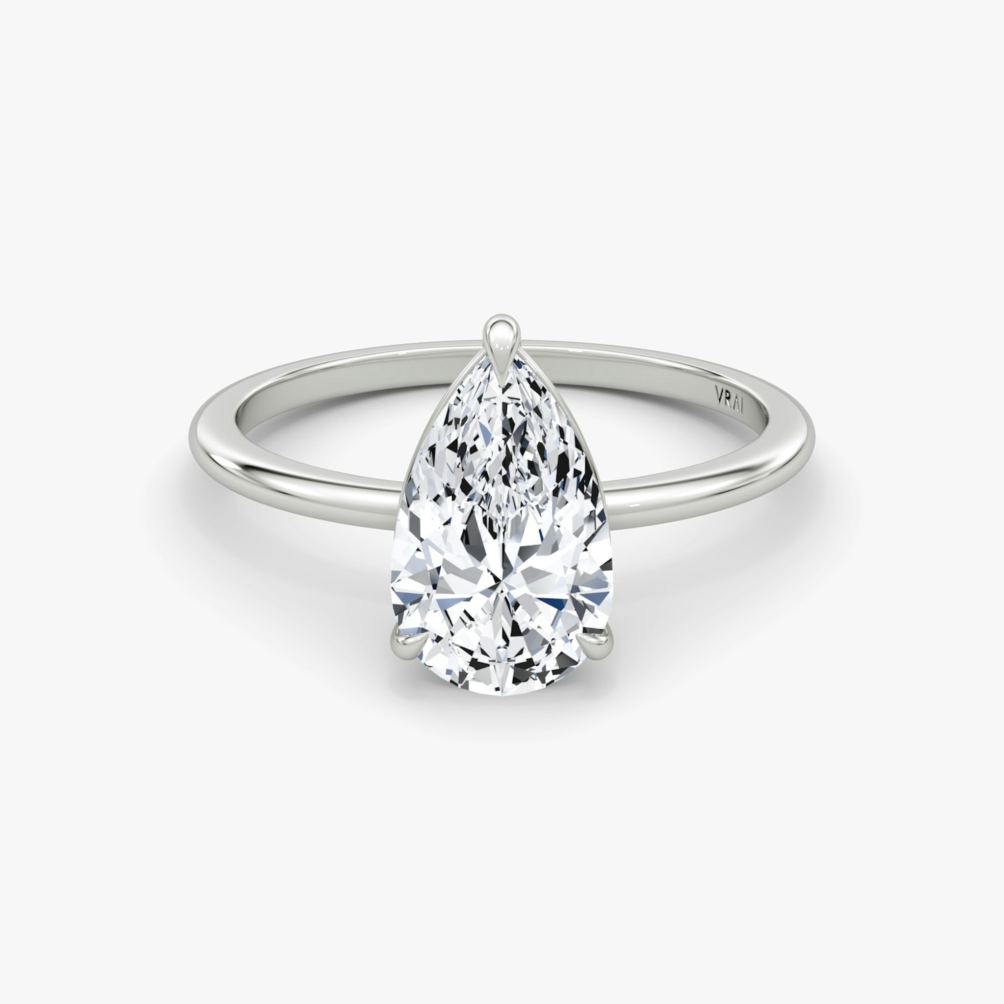 The Petite 4-Prong Solitaire | Pear | Platinum | bandAccent: Plain | diamondOrientation: vertical | caratWeight: other