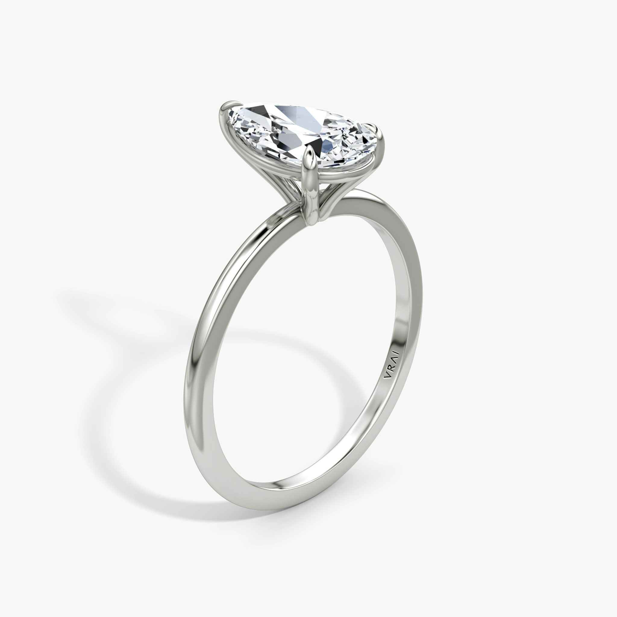 The Petite 4-Prong Solitaire | Pear | Platinum | bandAccent: Plain | diamondOrientation: vertical | caratWeight: other