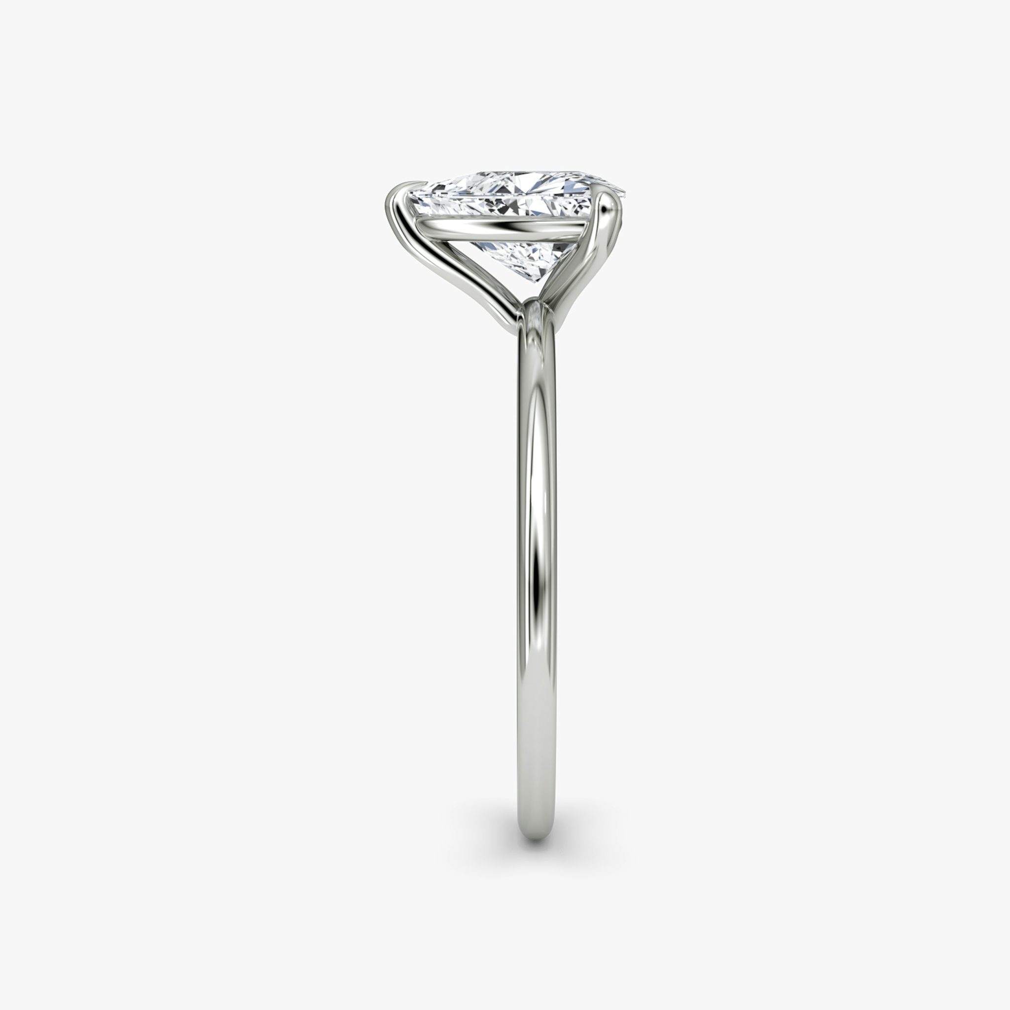 The Petite 4-Prong Solitaire | Trillion | Platinum | bandAccent: Plain | diamondOrientation: vertical | caratWeight: other