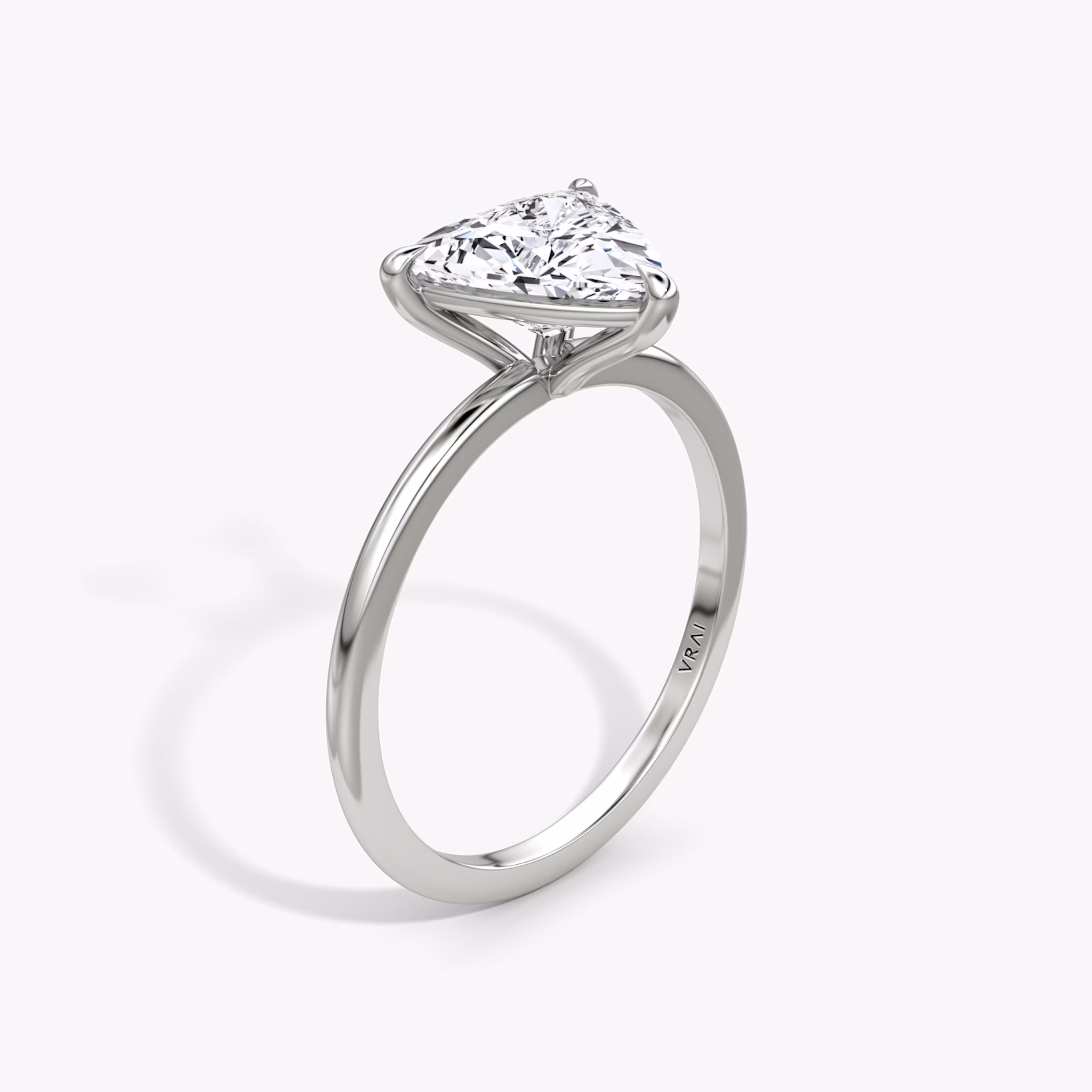The Petite 4-Prong Solitaire | Trillion | Platinum | bandAccent: Plain | diamondOrientation: vertical | caratWeight: other