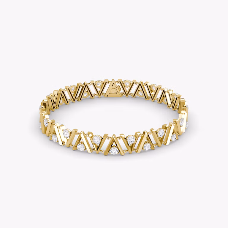 A V tennis bracelet in gold, with a white background.