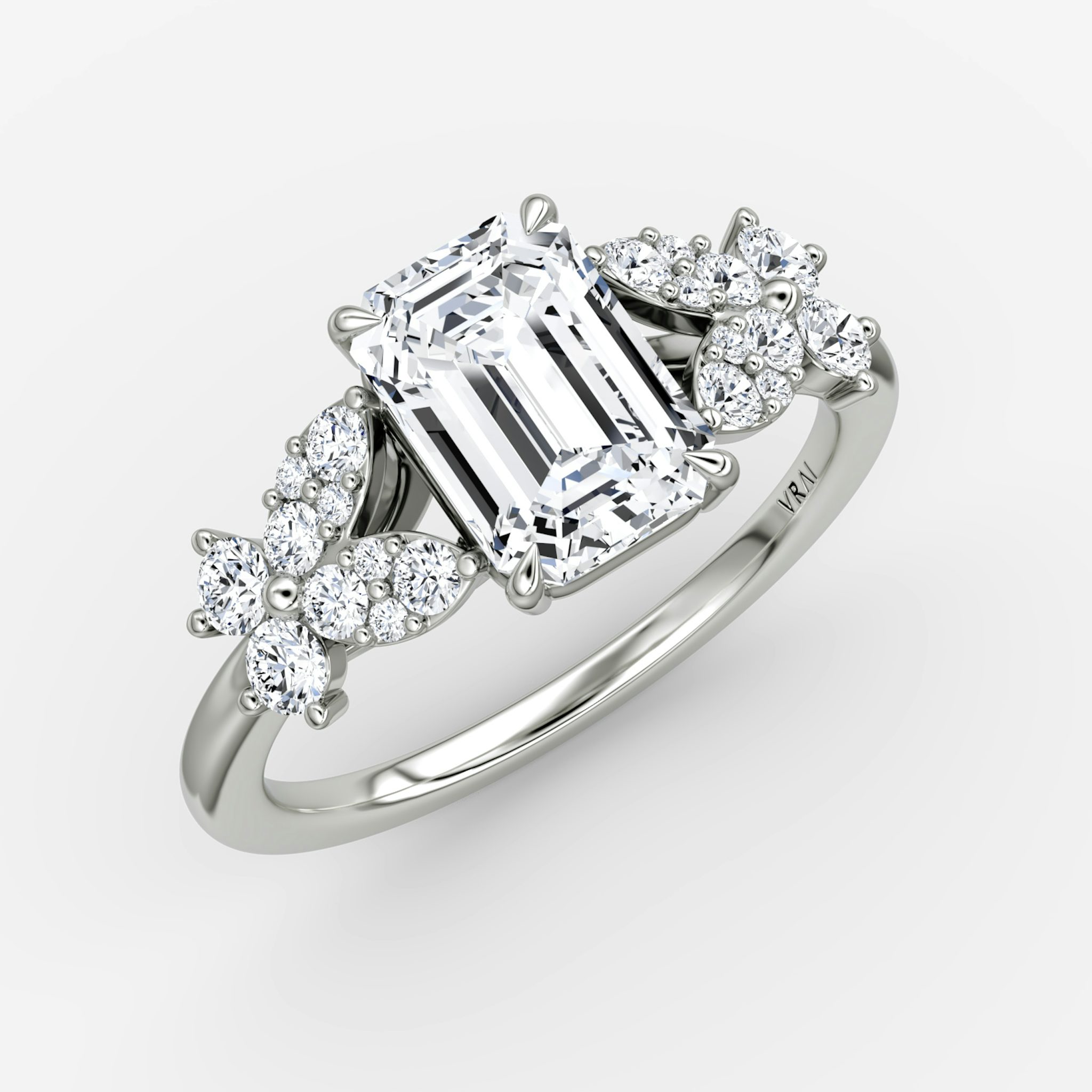The Signature Floral | Emerald | Platinum | bandAccent: Plain | diamondOrientation: vertical | caratWeight: other