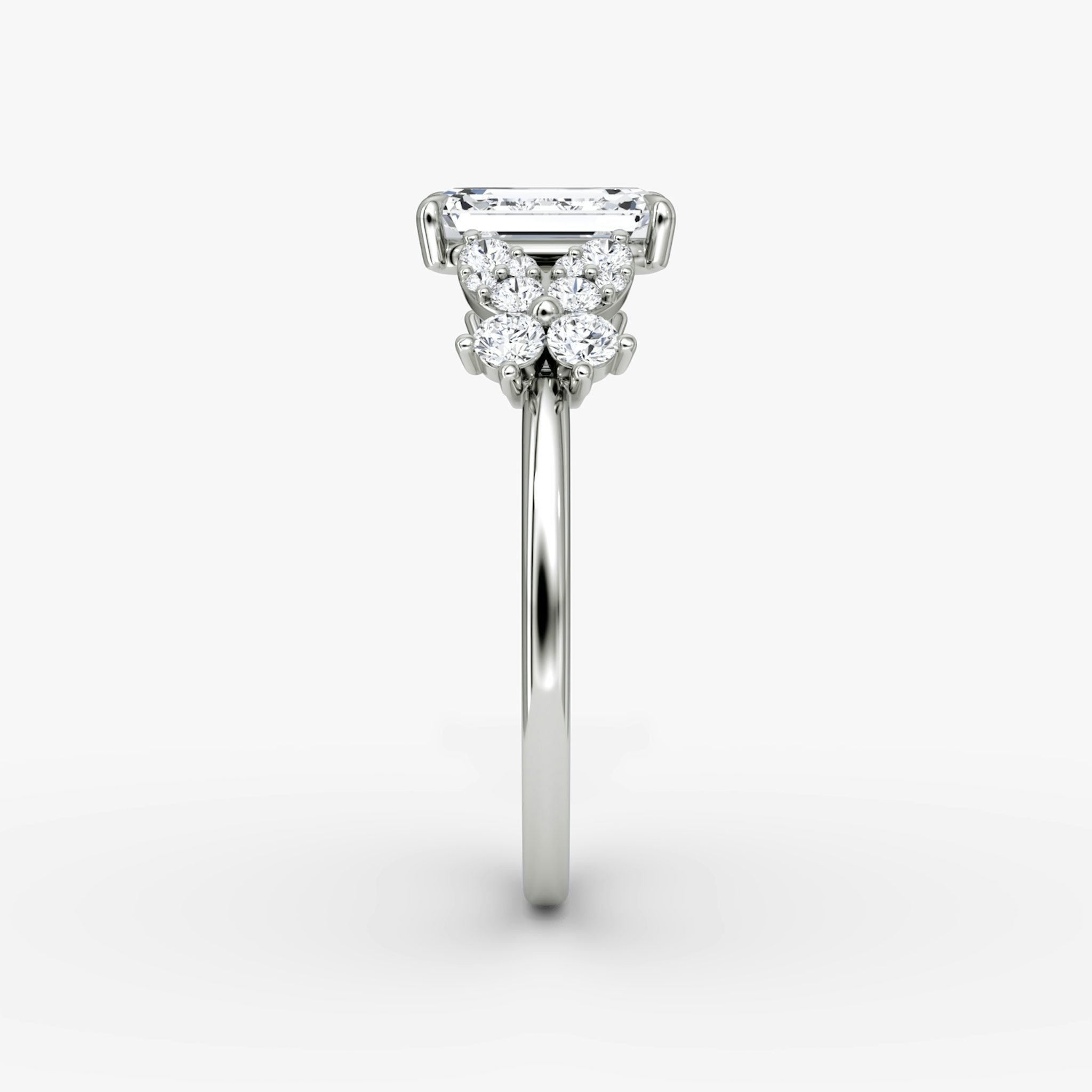 The Signature Floral | Emerald | Platinum | bandAccent: Plain | diamondOrientation: vertical | caratWeight: other