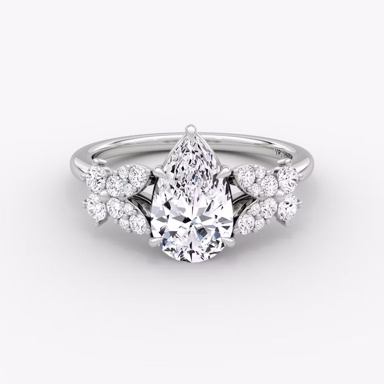 Front view of the signature floral pear white gold engagement ring