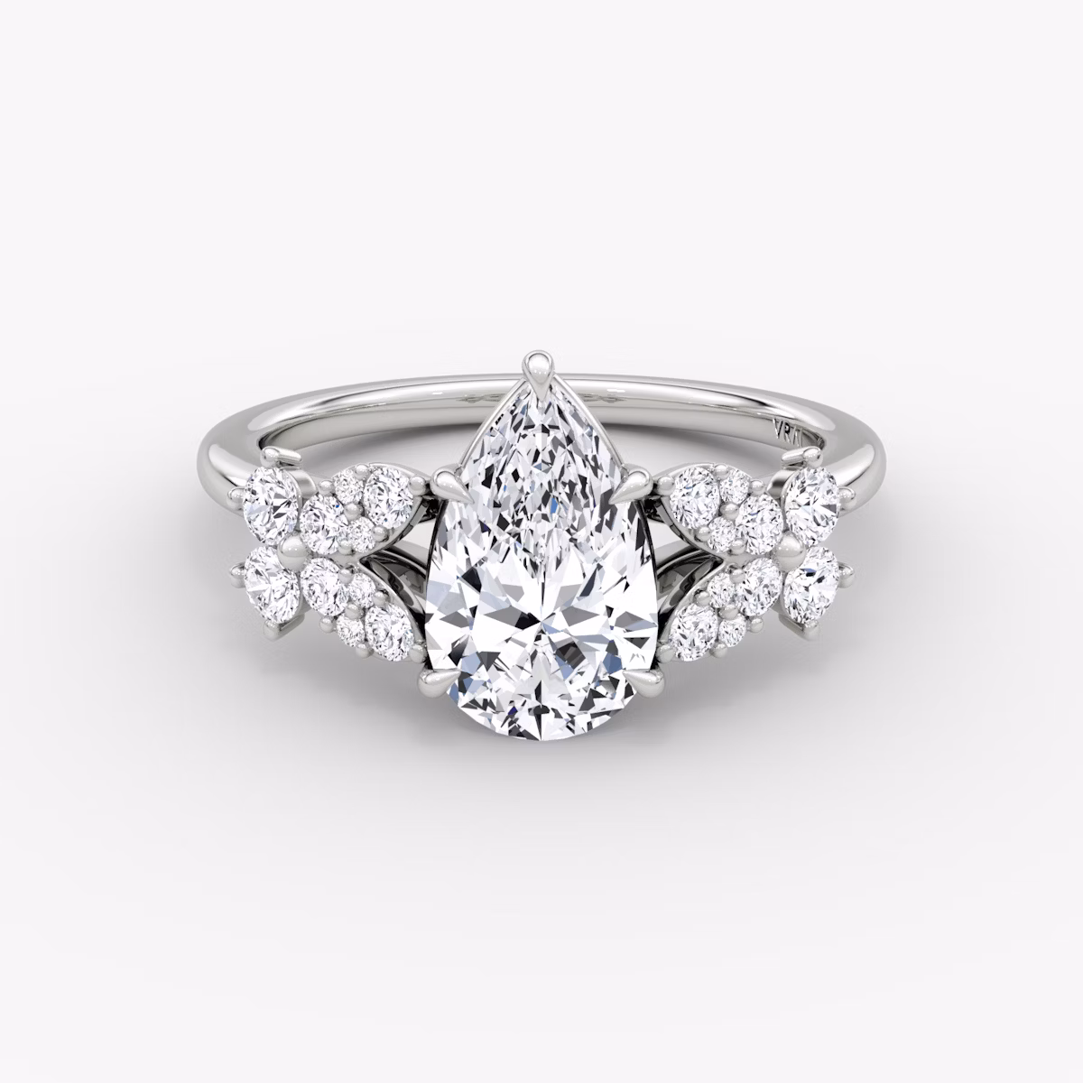 Front view of the signature floral pear white gold engagement ring
