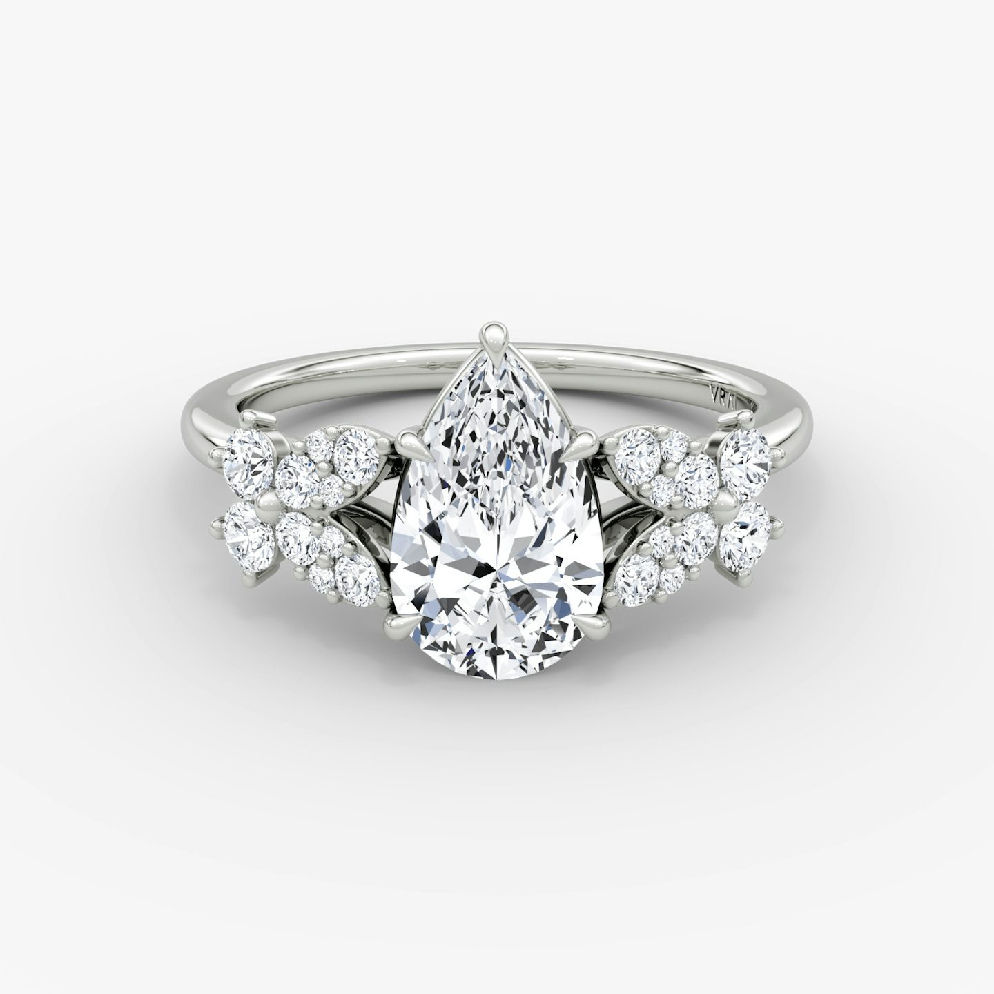 Front view of the signature floral pear white gold engagement ring