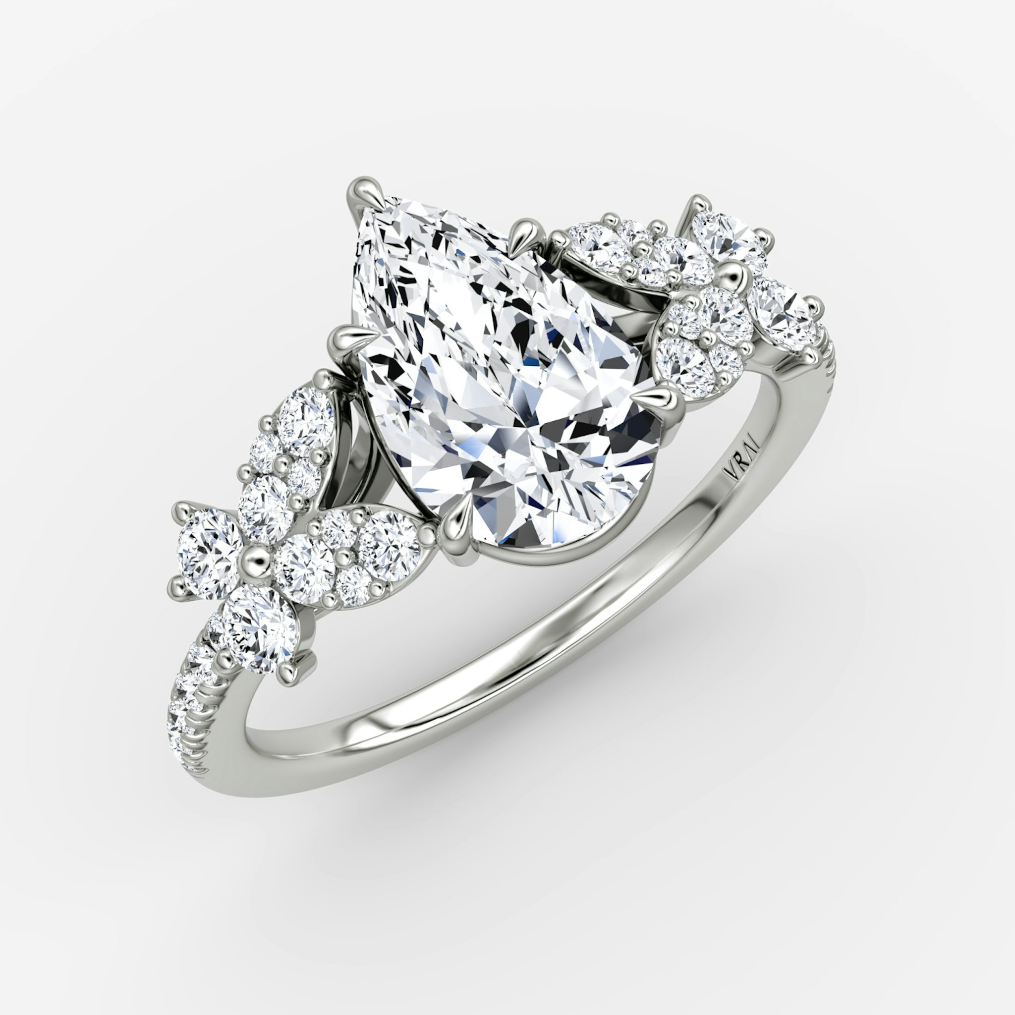 The Signature Floral | Pear | Platinum | bandAccent: Pavé | diamondOrientation: vertical | caratWeight: other