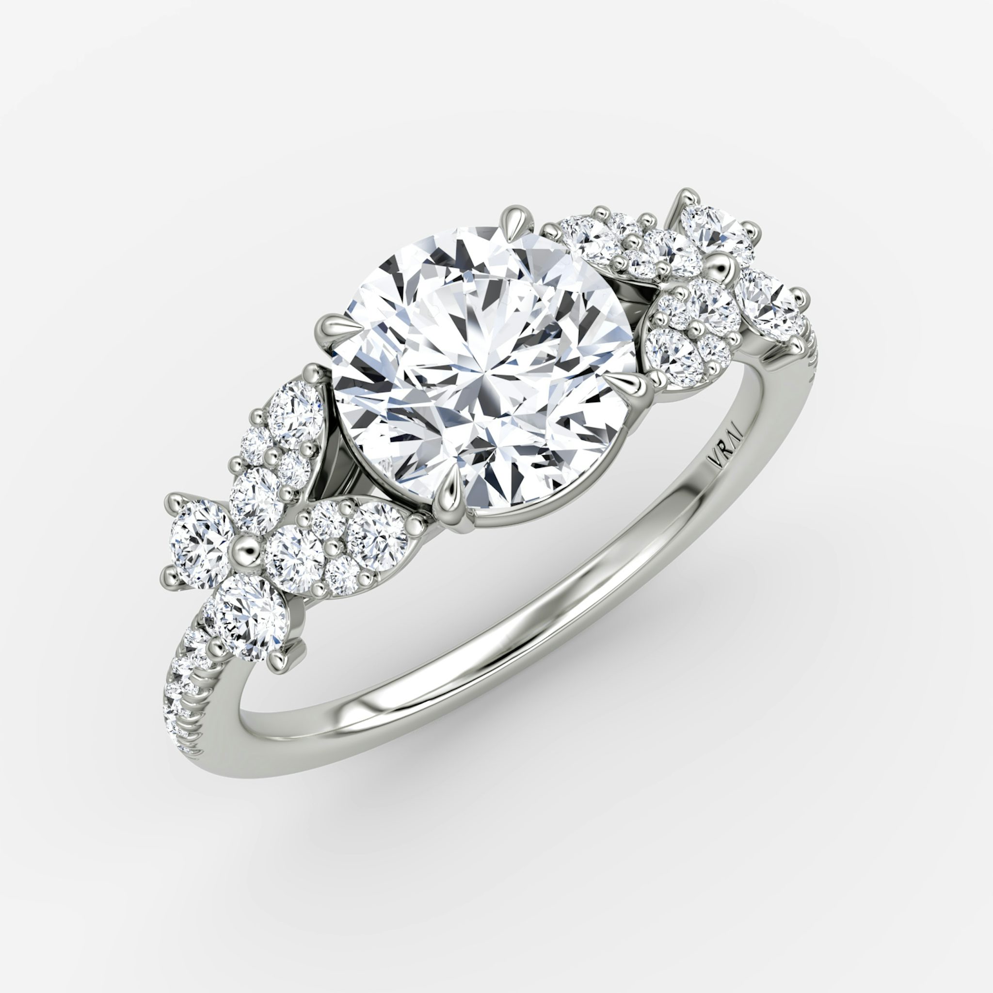 The Signature Floral | Round Brilliant | Platinum | bandAccent: Pavé | caratWeight: other | diamondOrientation: vertical