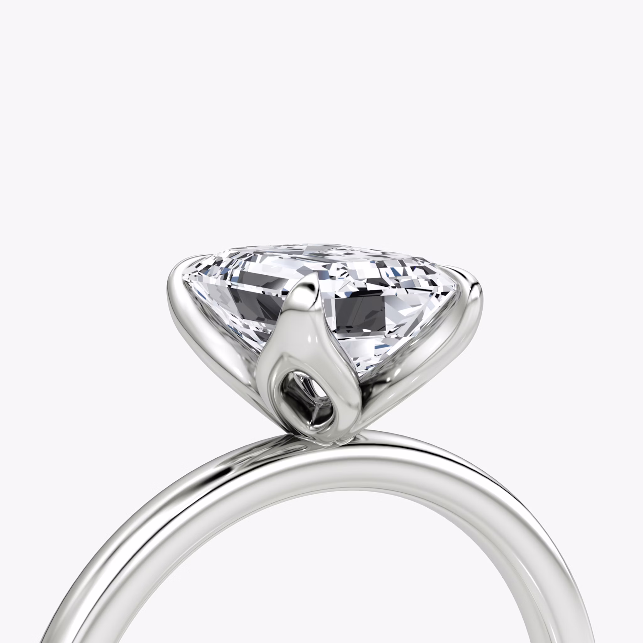 The Classic Petal | Emerald | Platinum | bandAccent: Plain | diamondOrientation: vertical | caratWeight: other