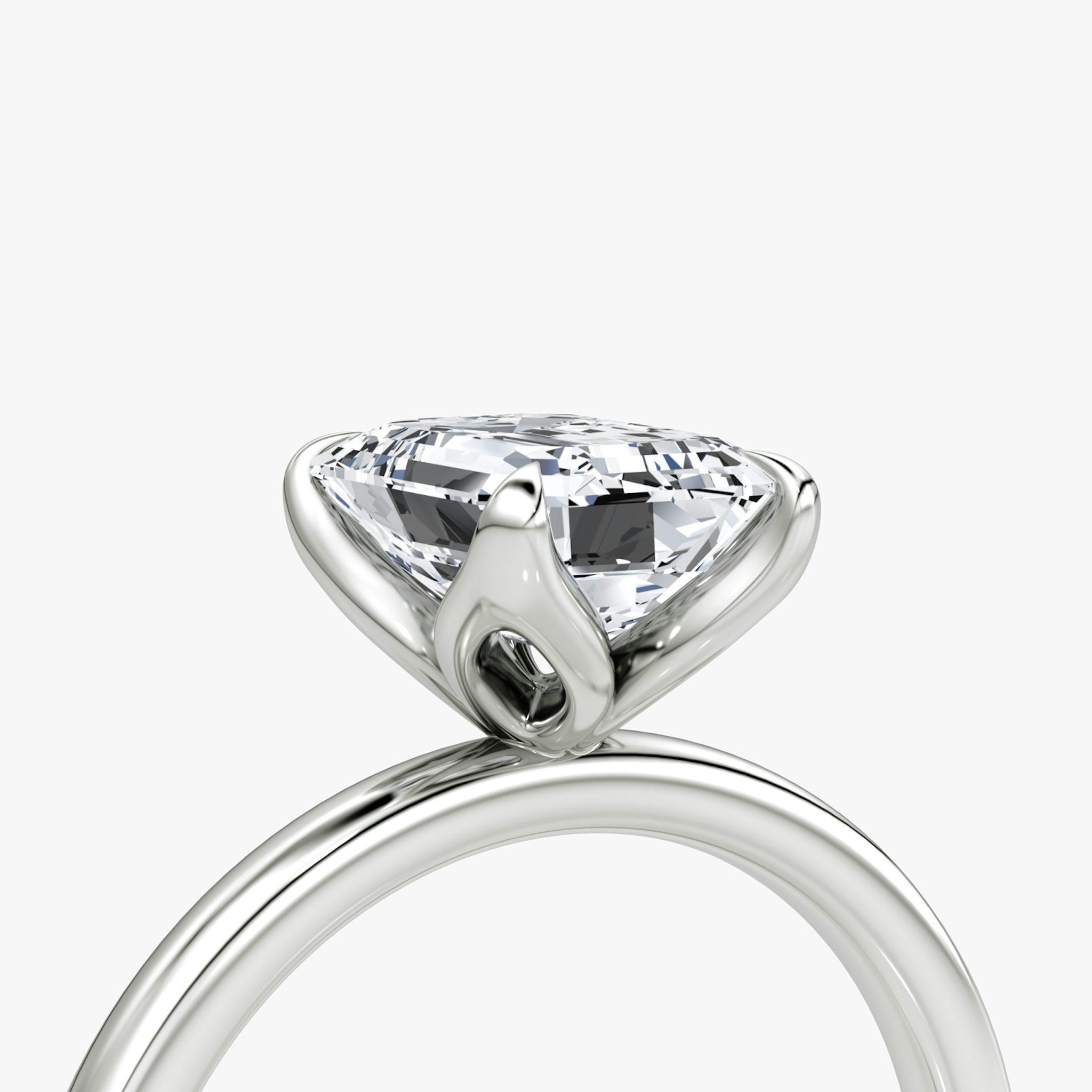 The Classic Petal | Emerald | Platinum | bandAccent: Plain | diamondOrientation: vertical | caratWeight: other