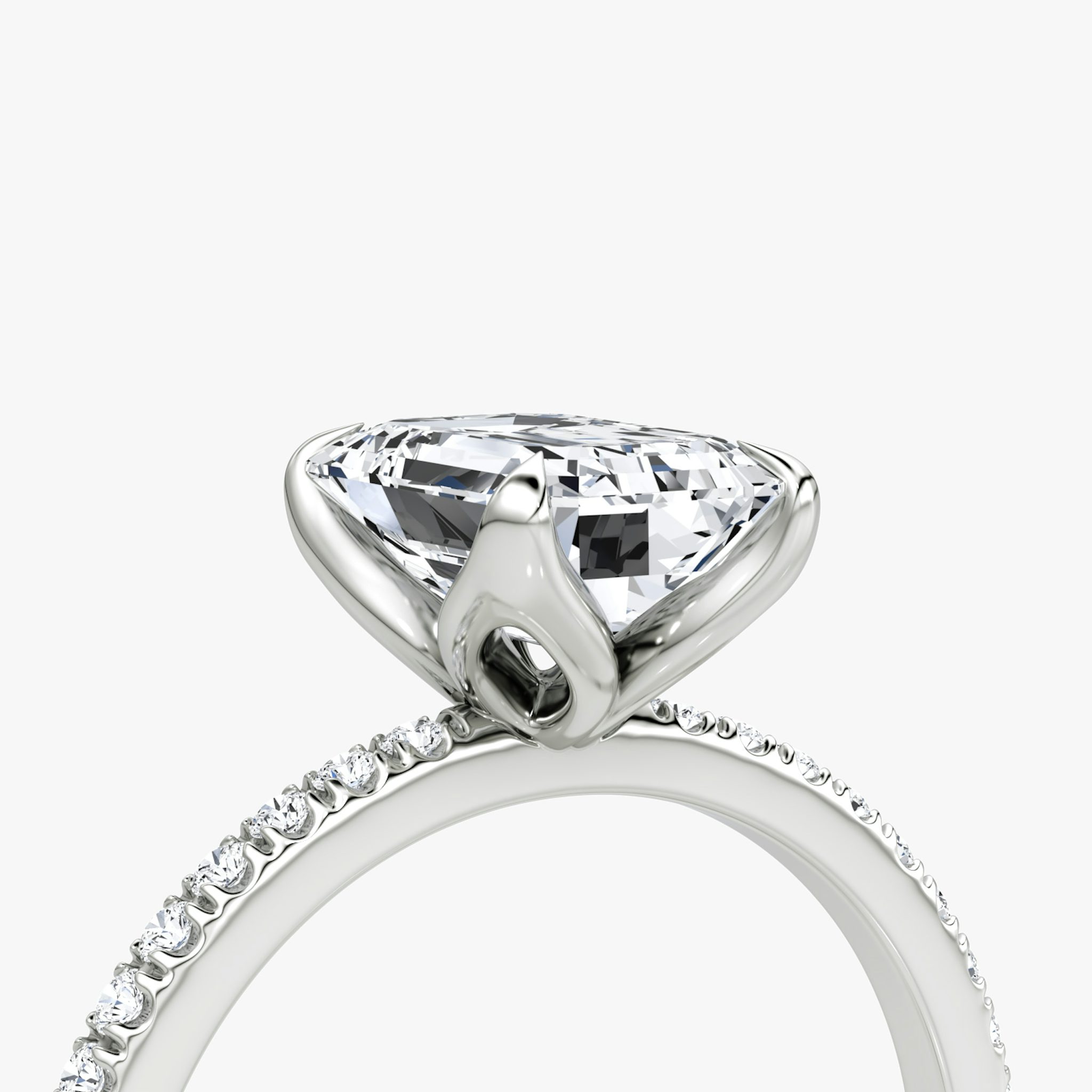 The Classic Petal | Emerald | Platinum | bandAccent: Pavé | diamondOrientation: vertical | caratWeight: other
