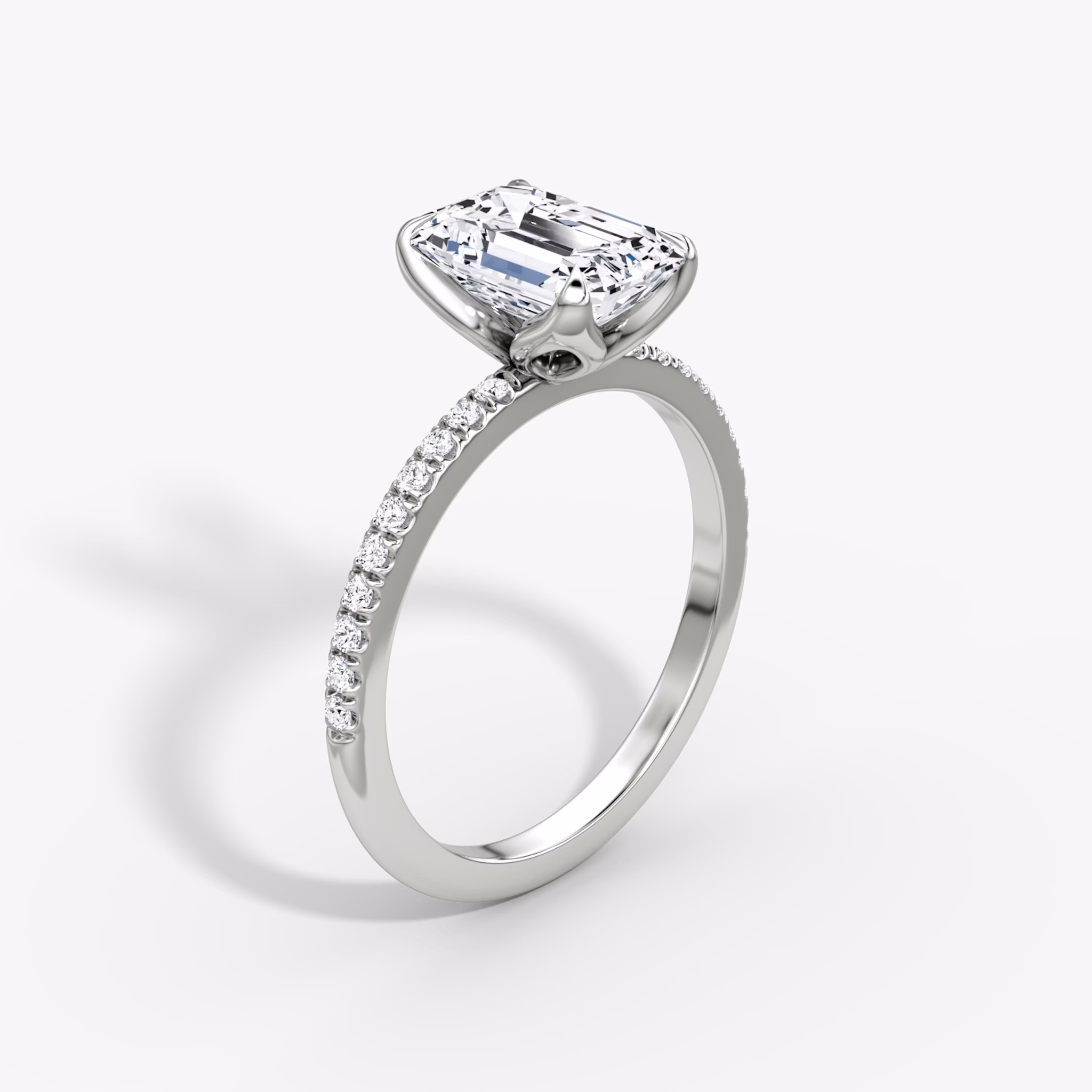The Classic Petal | Emerald | Platinum | bandAccent: Pavé | diamondOrientation: vertical | caratWeight: other