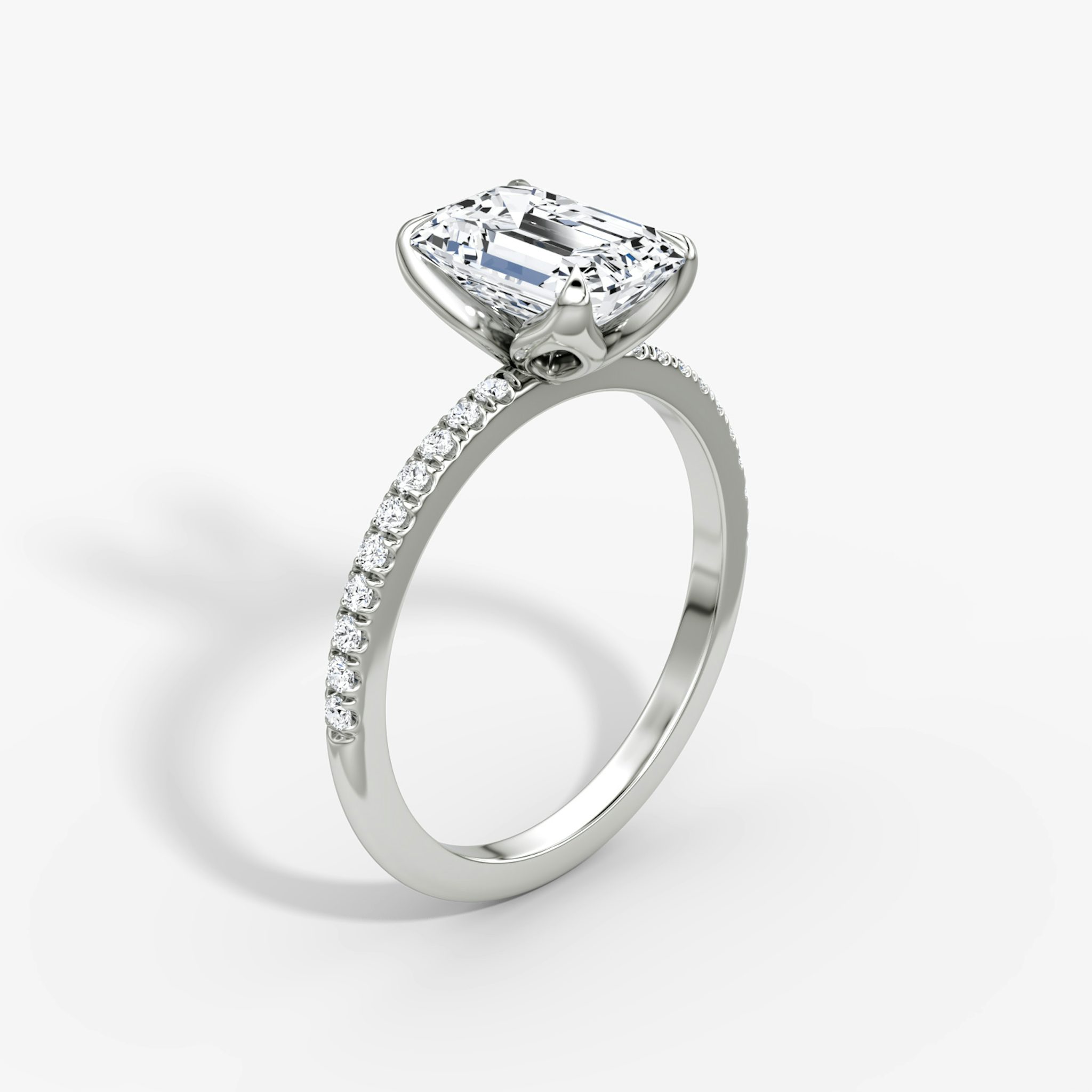 The Classic Petal | Emerald | Platinum | bandAccent: Pavé | diamondOrientation: vertical | caratWeight: other