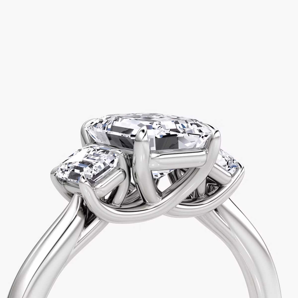 The Trellis Three Stone | Emerald | Platinum | bandAccent: Plain | diamondOrientation: vertical | caratWeight: other