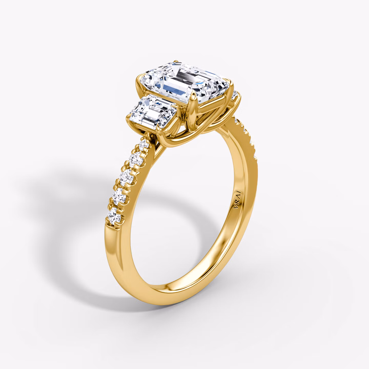The Trellis Three Stone Emerald | Yellow Gold