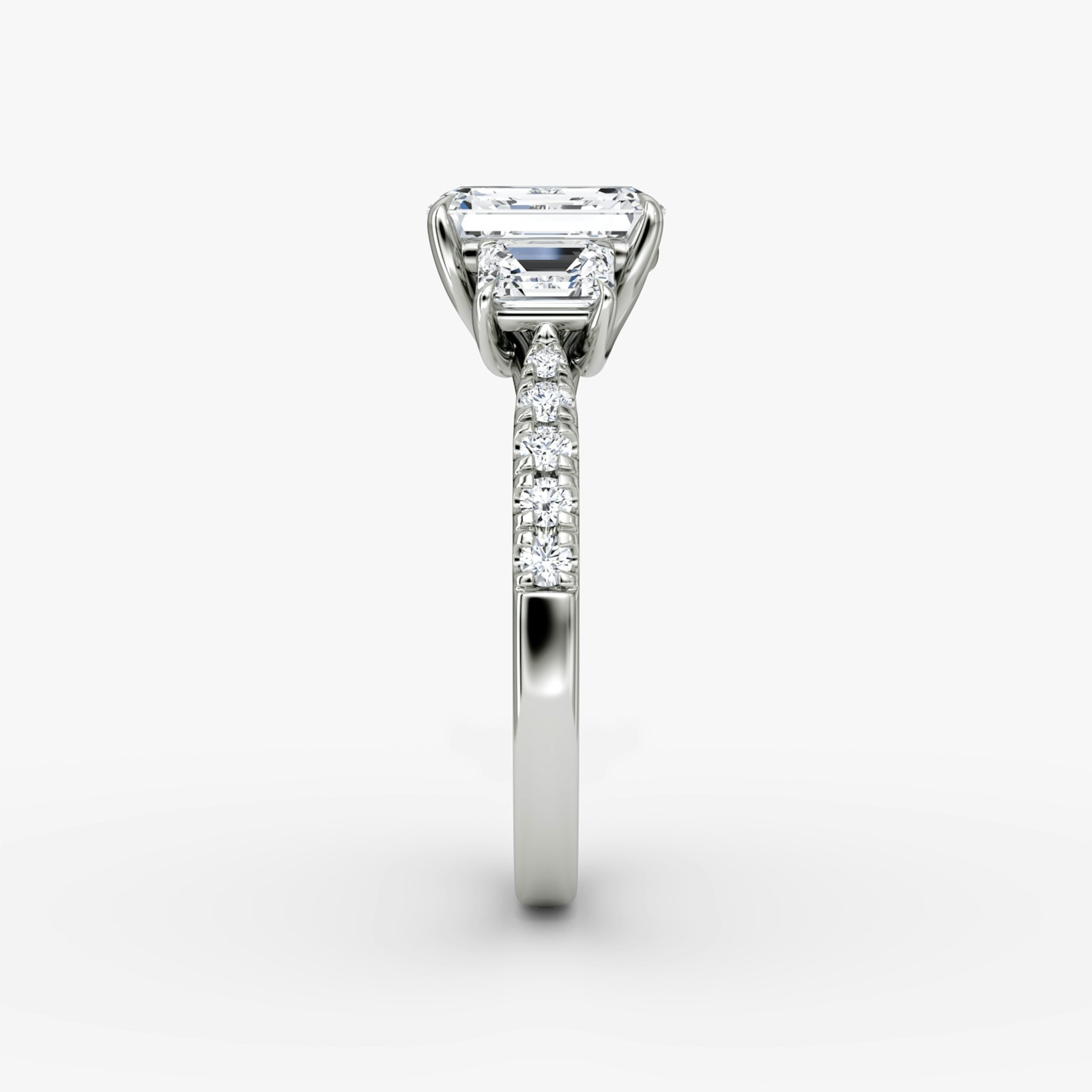 The Trellis Three Stone | Emerald | Platinum | bandAccent: Pavé | diamondOrientation: vertical | caratWeight: other