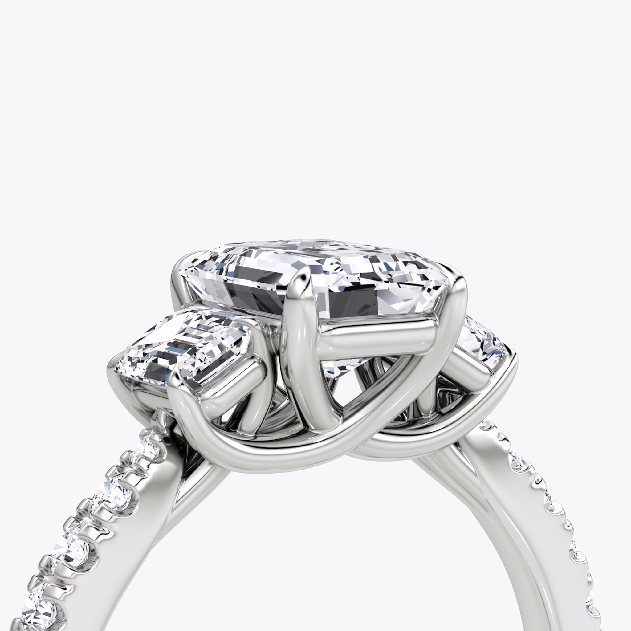 The Trellis Three Stone | Emerald | Platinum | bandAccent: Pavé | diamondOrientation: vertical | caratWeight: other