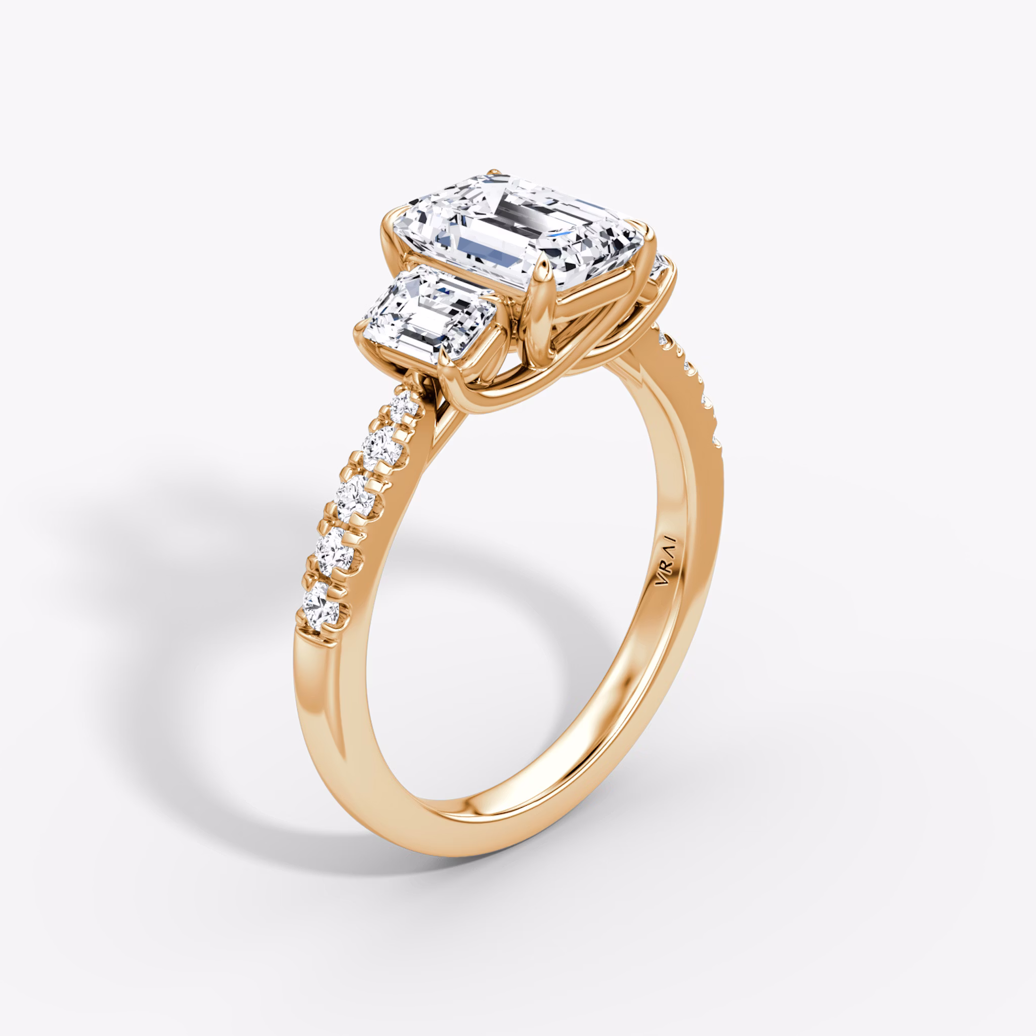 The Trellis Three Stone | Emerald | 14k | Rose Gold | bandAccent: Pavé | diamondOrientation: vertical | caratWeight: other